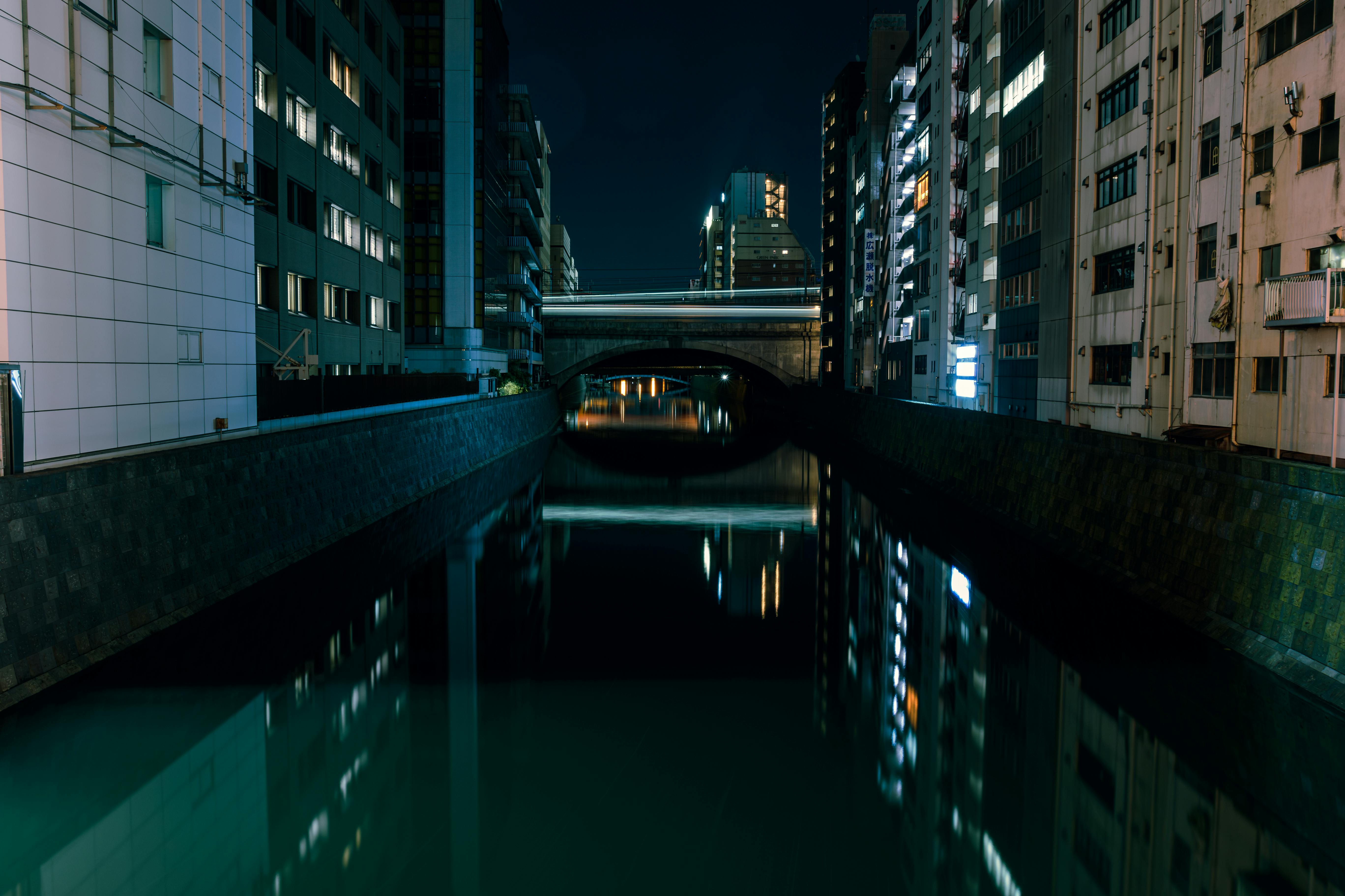 5472x3648 View of a Canal with a Bridge between Apartment Blocks in Akihabara, Tokyo, Japan · Free