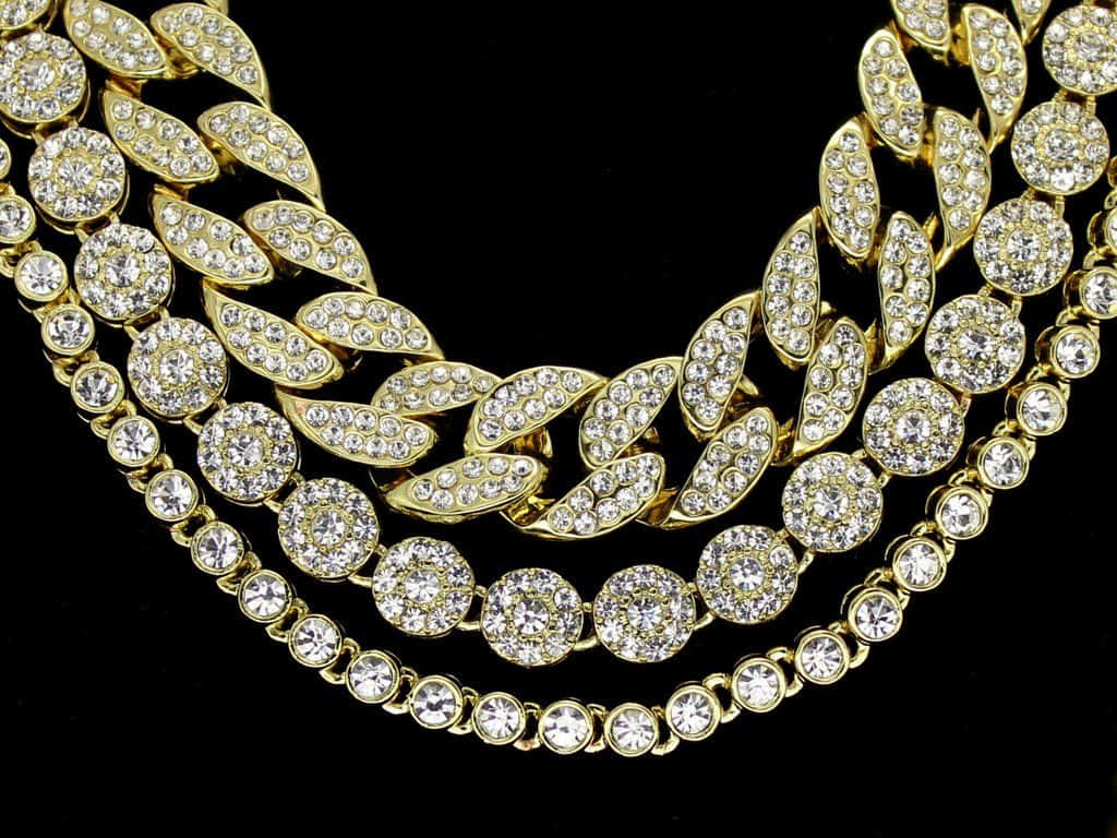 1024x768 Download Elevate your style with this golden chain. Wallpaper