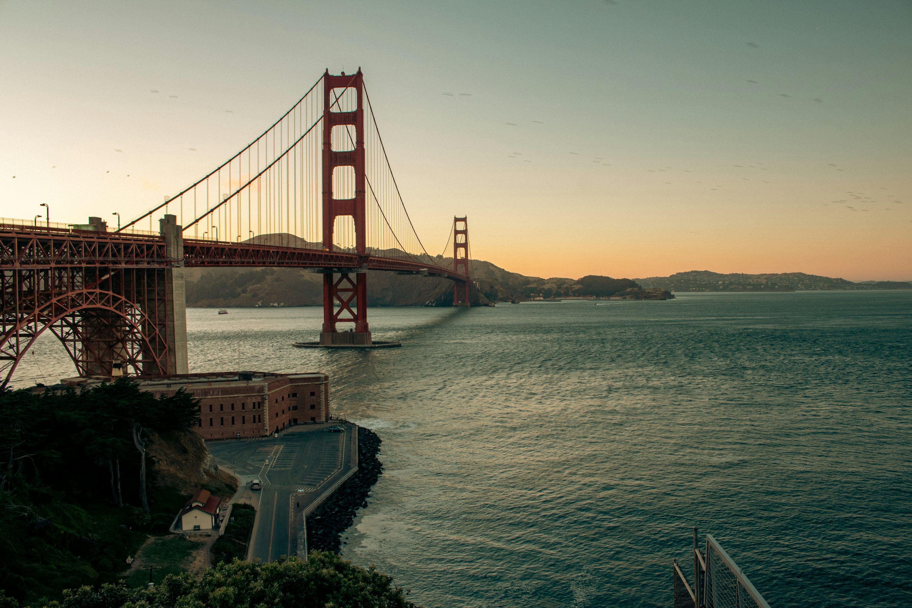 3000x2000 A view of the golden gate bridge at sunset photo