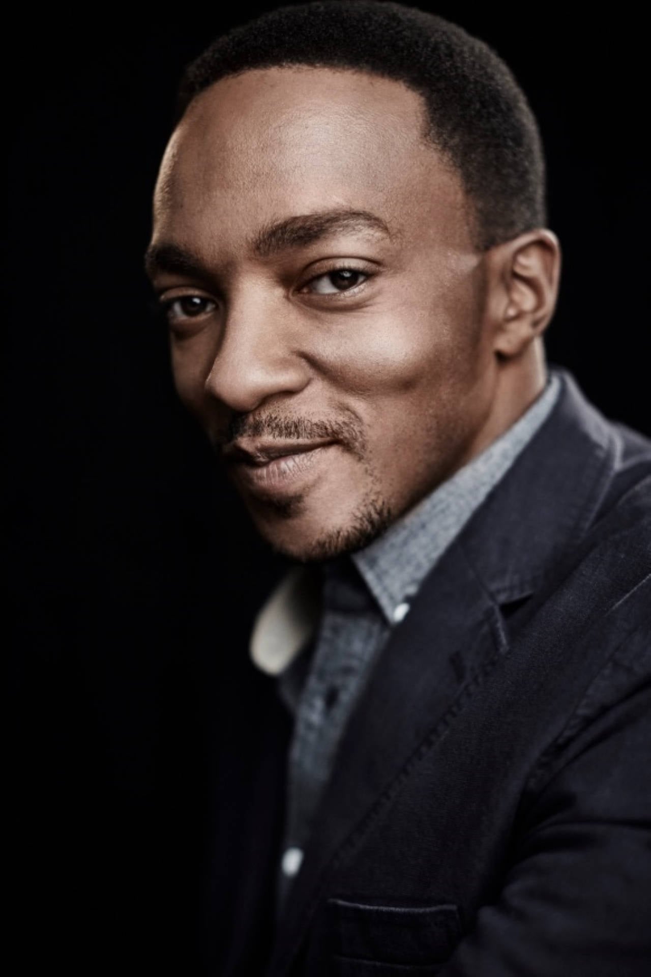 1280x1920 Download Anthony Mackie Shy Smile Wallpaper