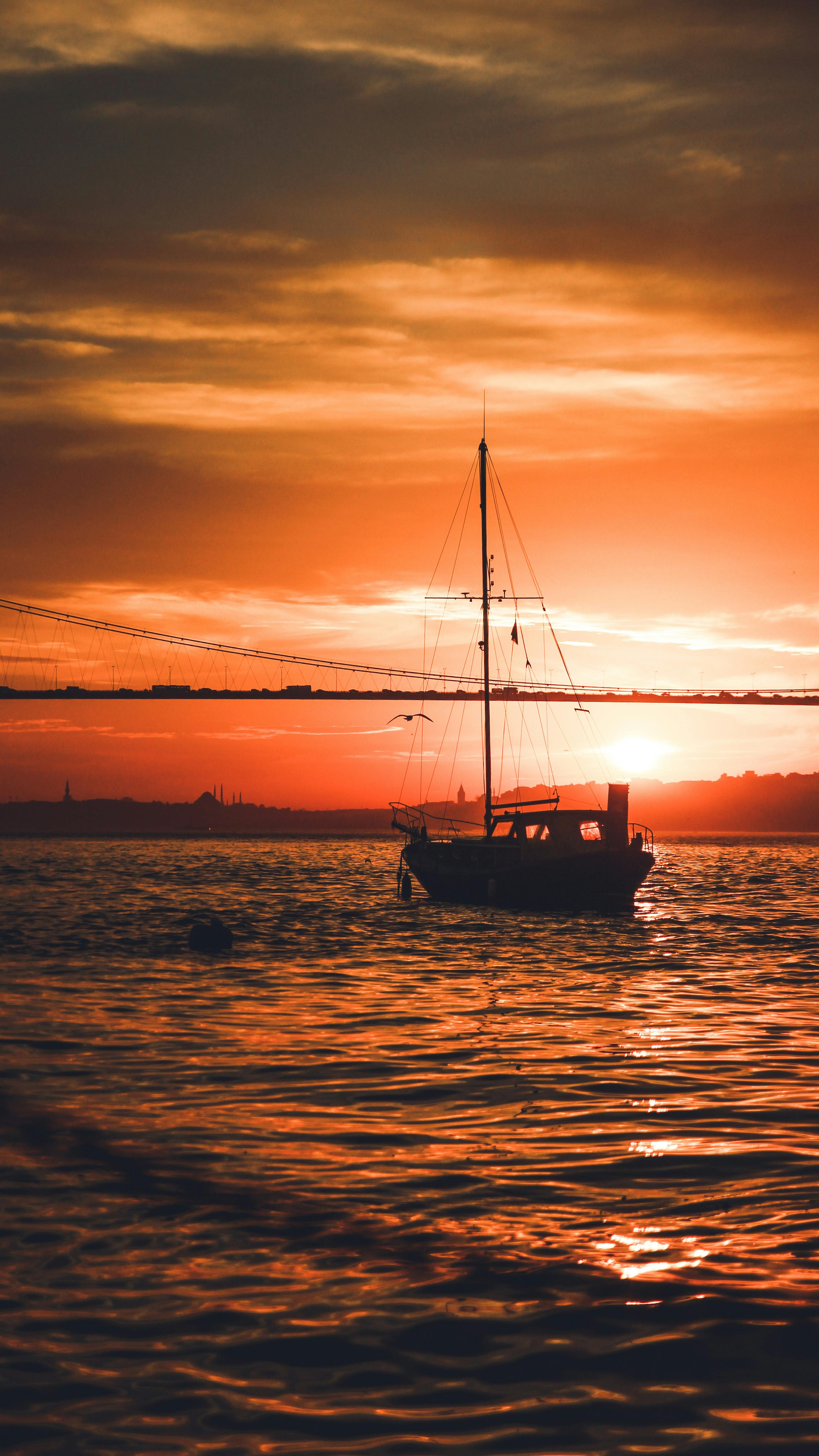 2833x5036 Sailing yacht floating at sunset time · Free