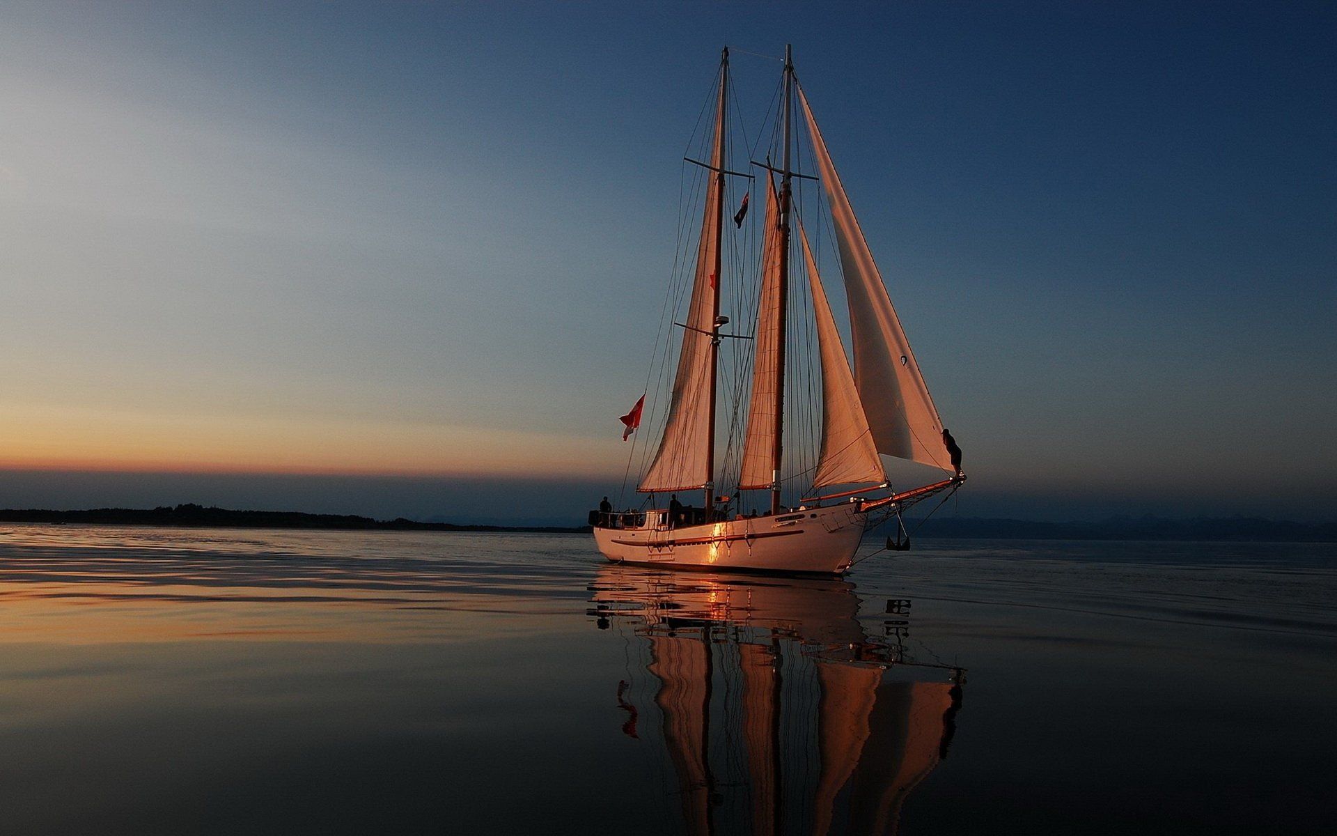 1920x1200 Serene Sailboat at Sunset