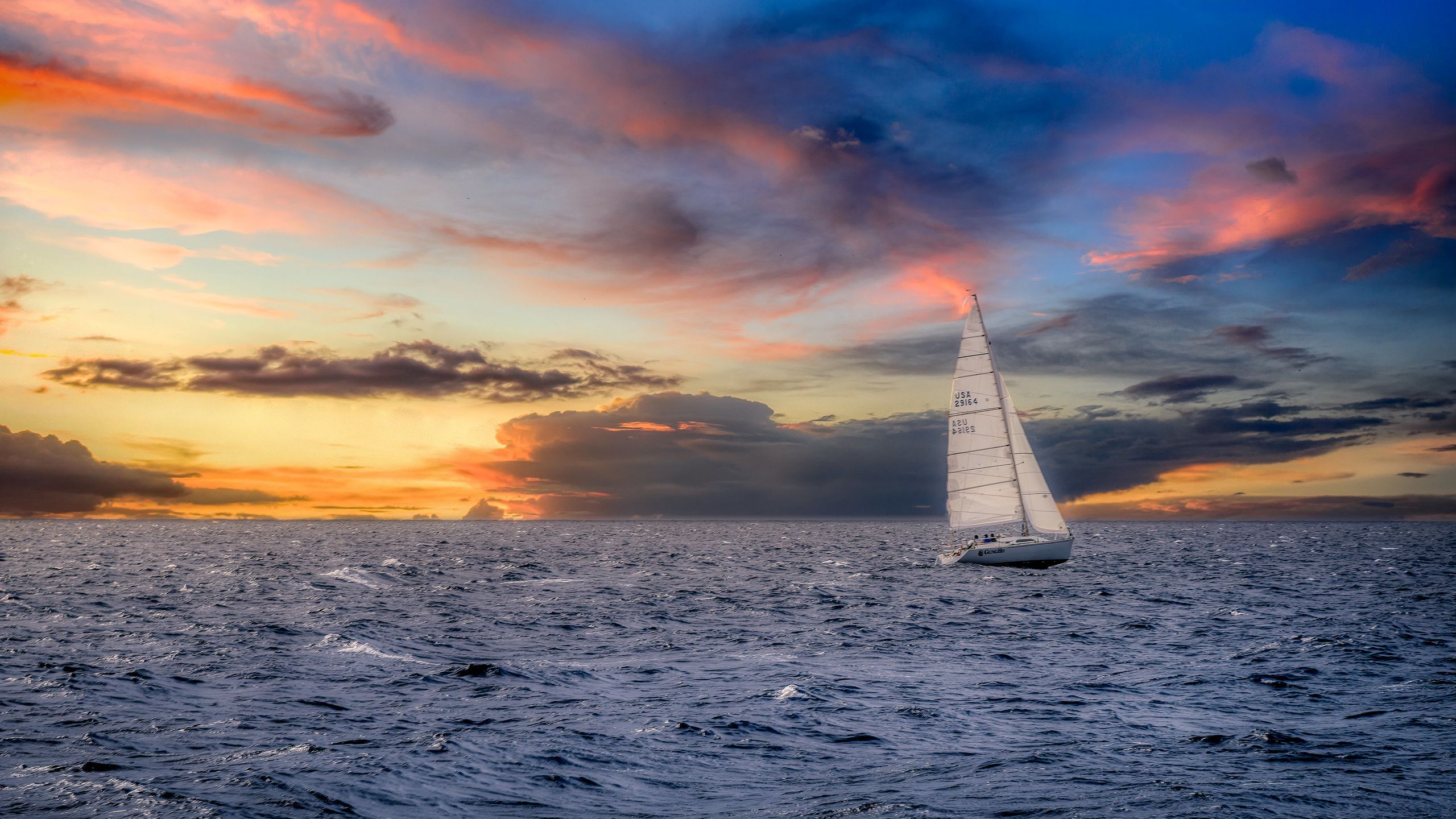 2560x1440 Download wallpaper 2560x1440 sailboat, sunset, sea, horizon widescreen 16:9 HD background