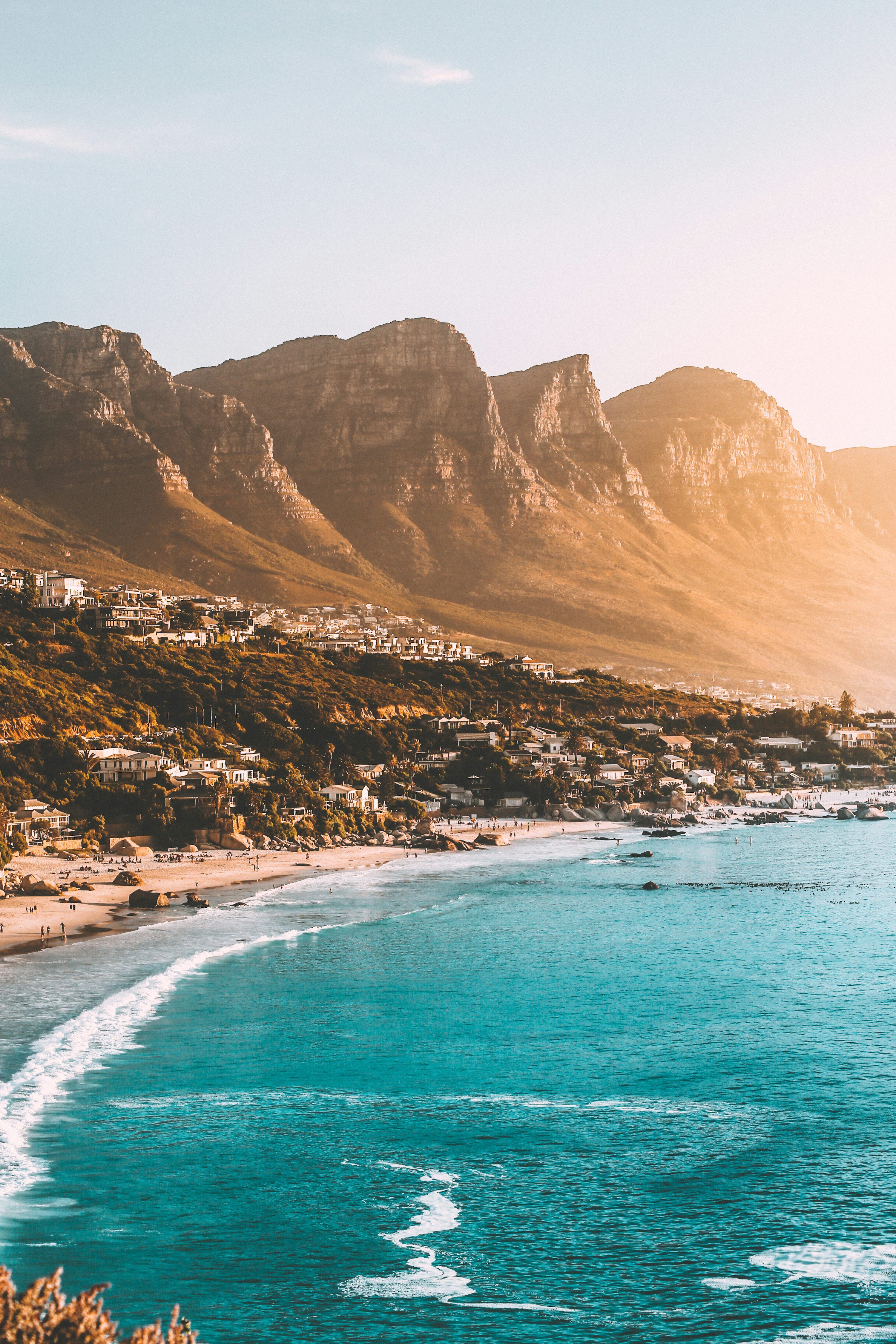 3000x4500 People on beach shore photo