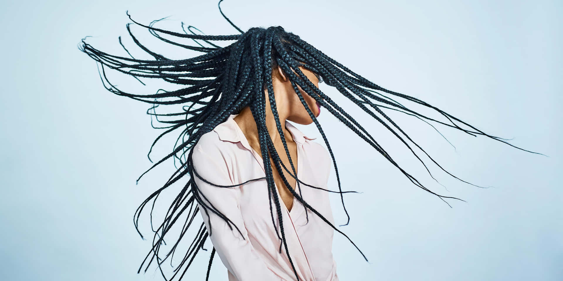 1920x960 Download A Woman With Braided Hair Is Flying In