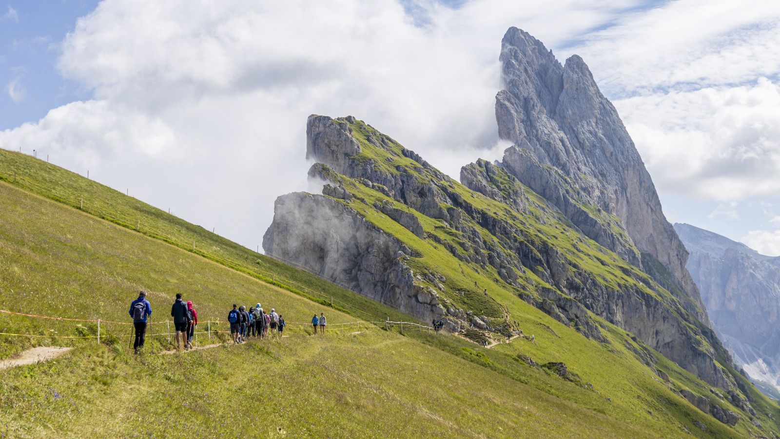 1600x900 Italy's Dramatic Mountain Cliffs, Lush Meadows, And Unmatched Views Await In This Alpine Paradise