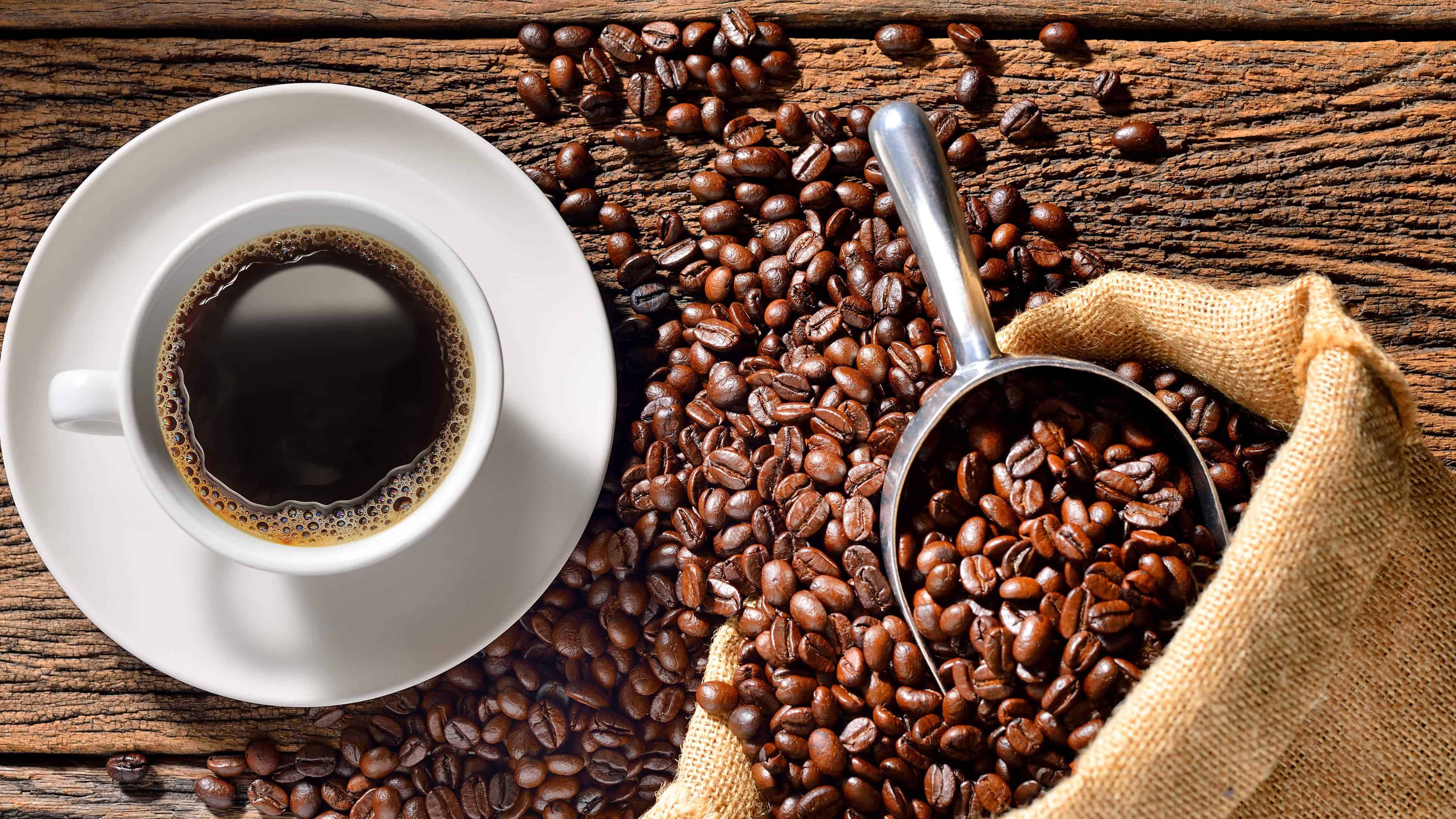 3840x2160 Cup Of Coffee And Roasted Beans On Wood Table Uhd 4k
