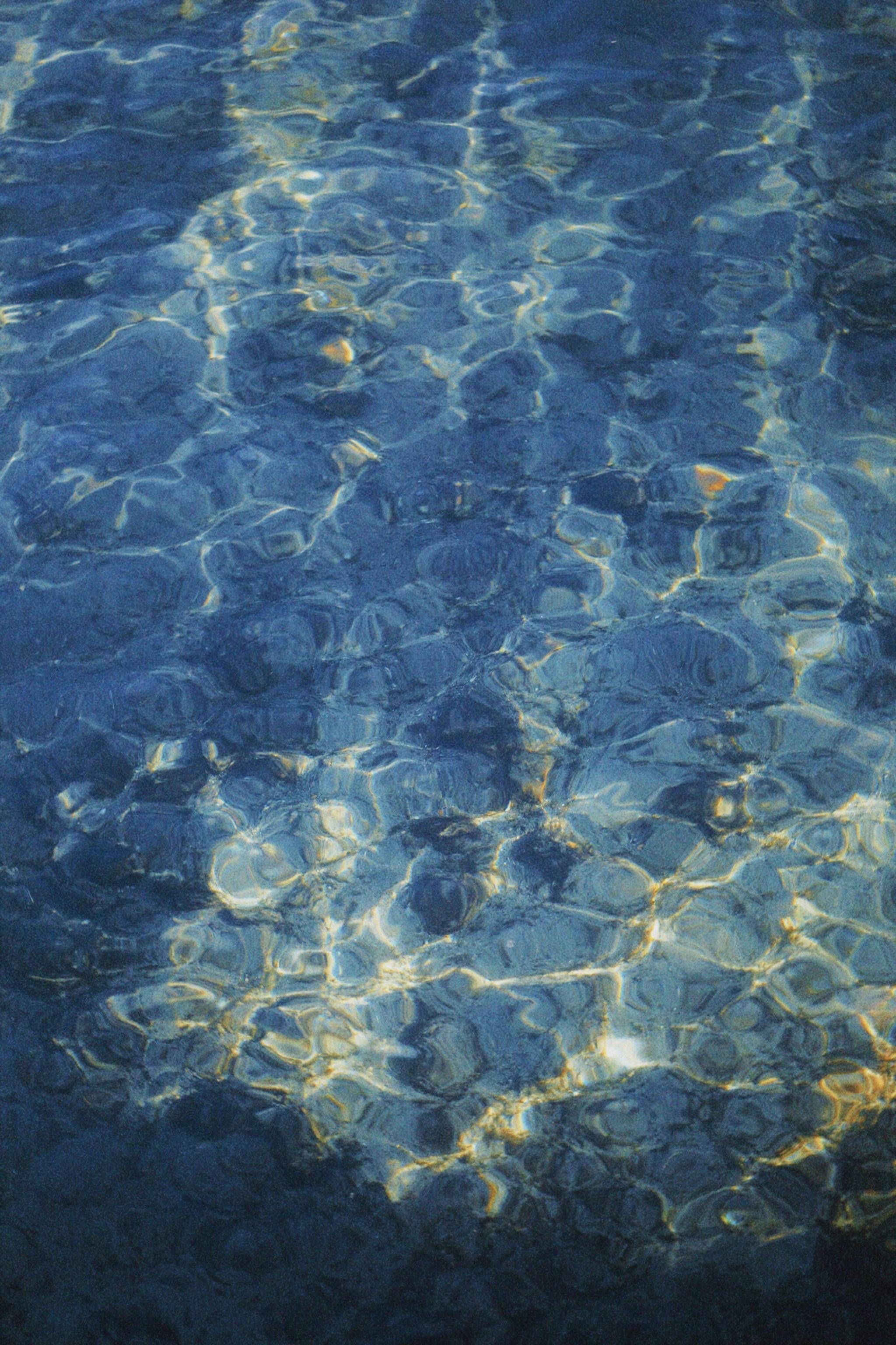 2048x3072 Blue Water with Ripples and Reflections · Free