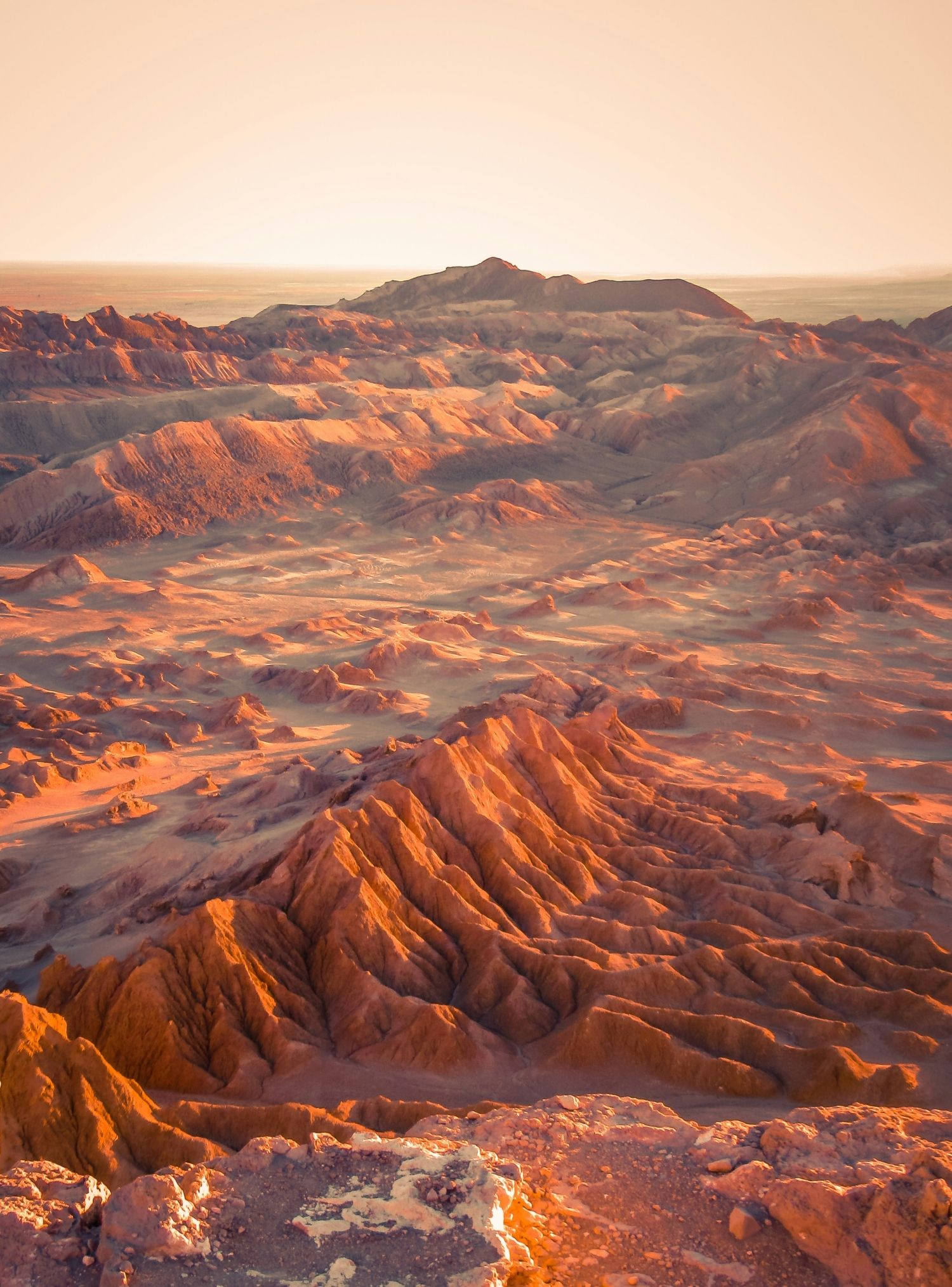 1500x2028 Desert Rock Formations At Sunset With Sun Reflecting Off Sand