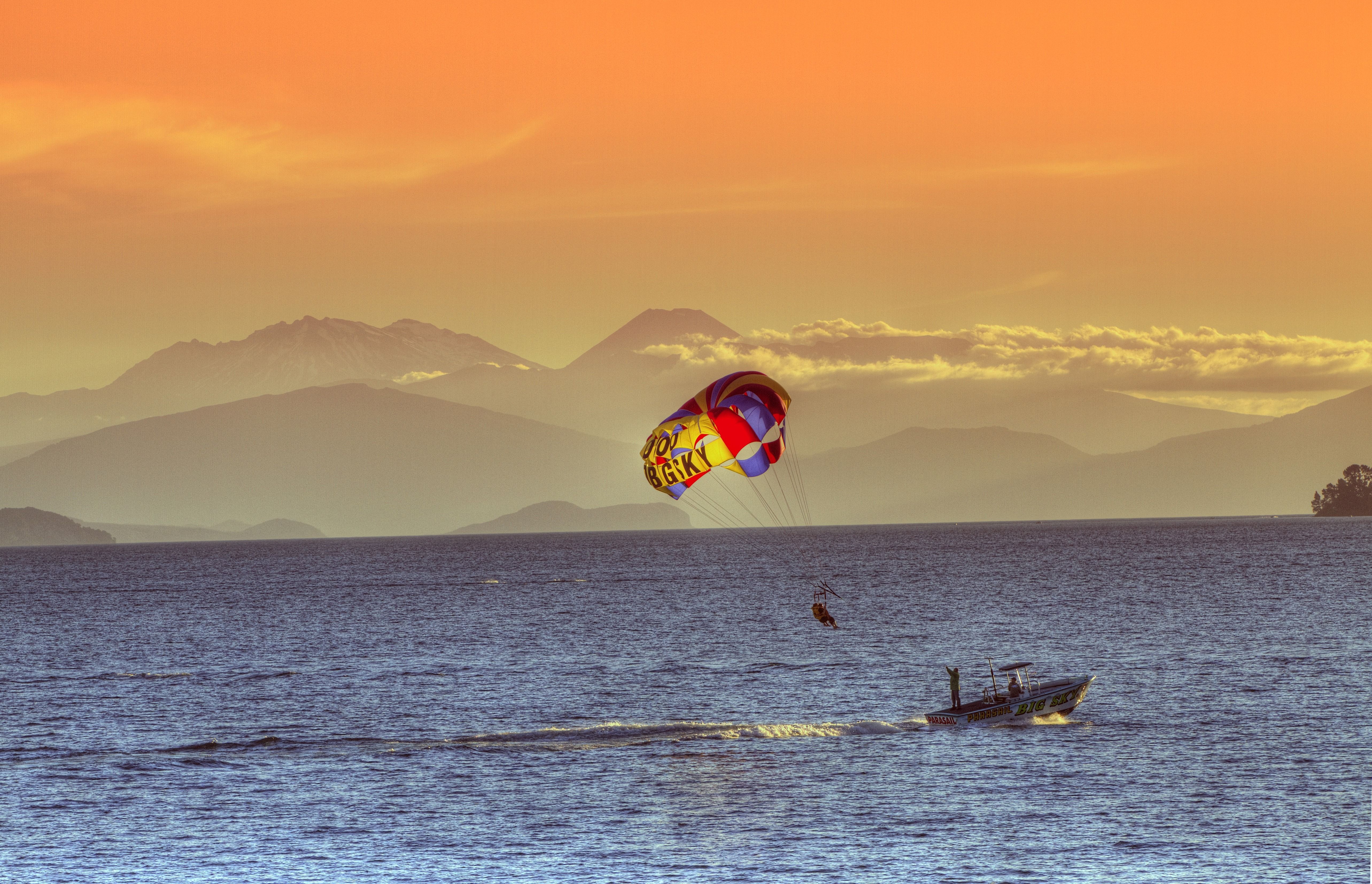 5134x3306 Royalty Free Photo: Person Parasailing During Dusk
