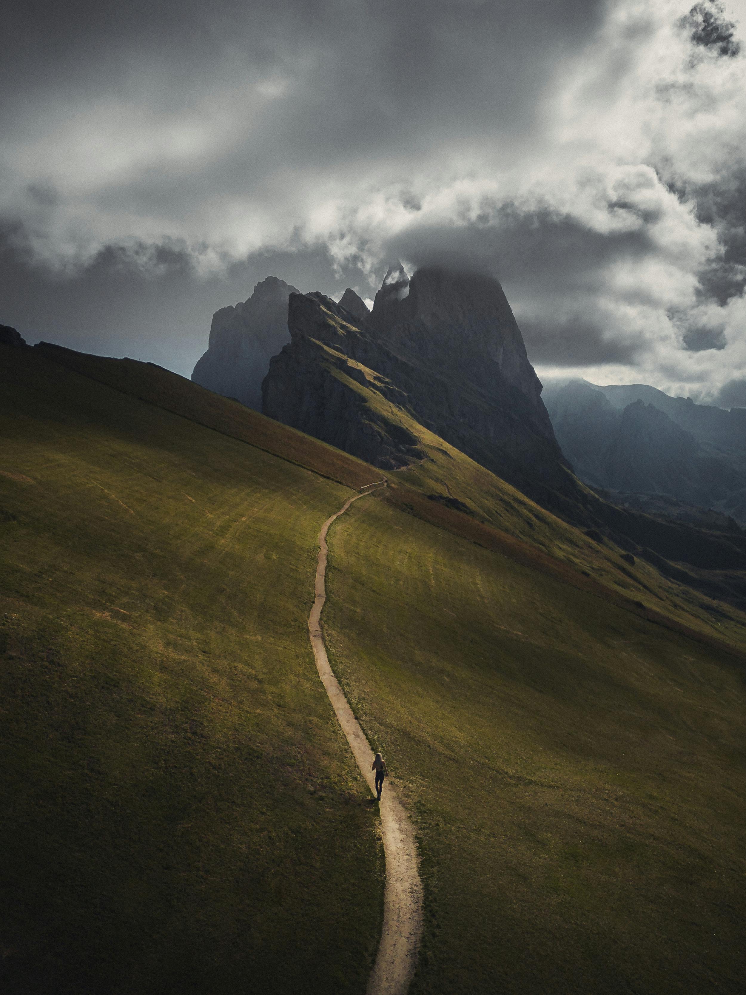 2500x3335 Backpacker Hiking on a Lonely Trail in the Mountains · Free