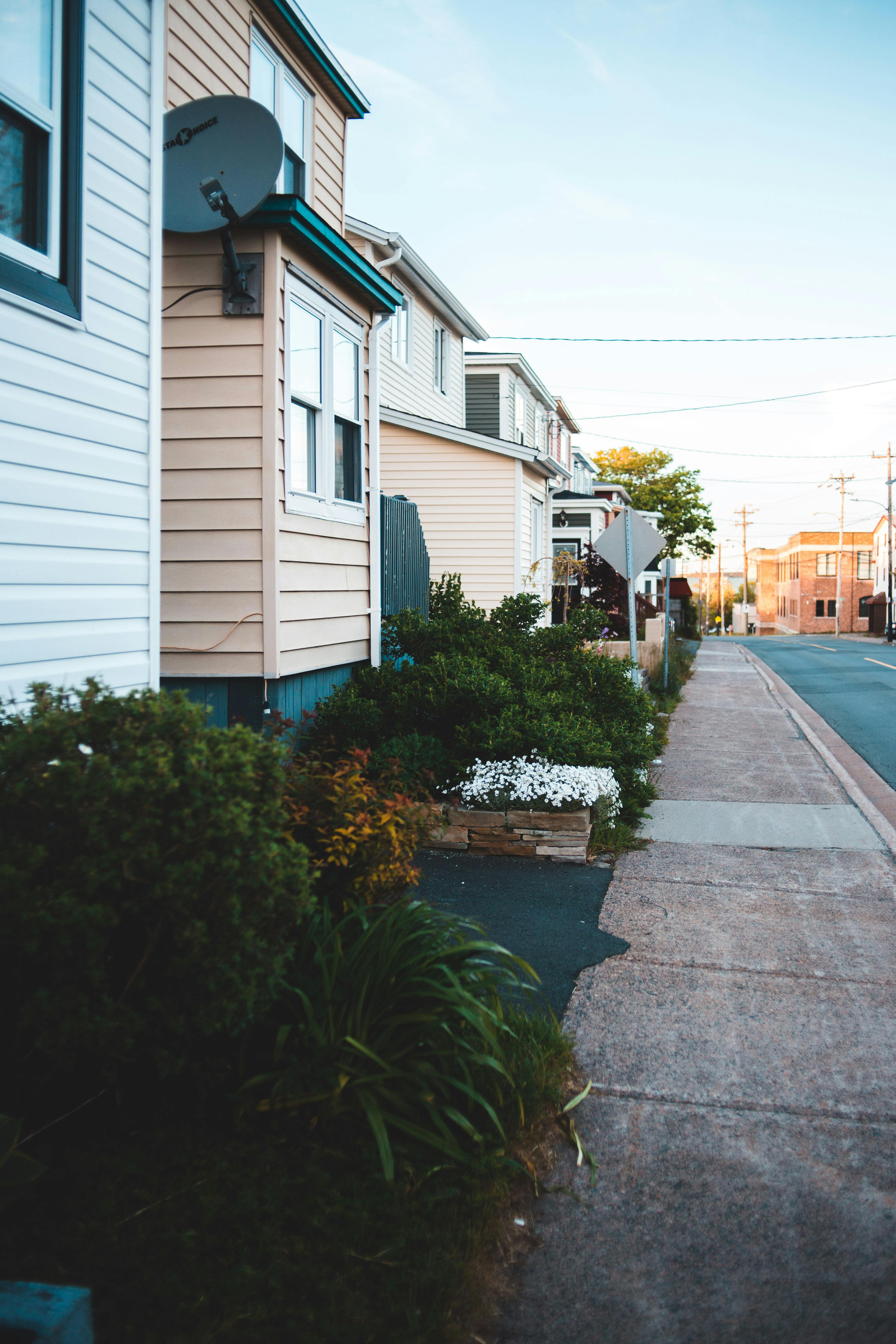3648x5472 Small Wooden Houses on Town Street on Sunset · Free