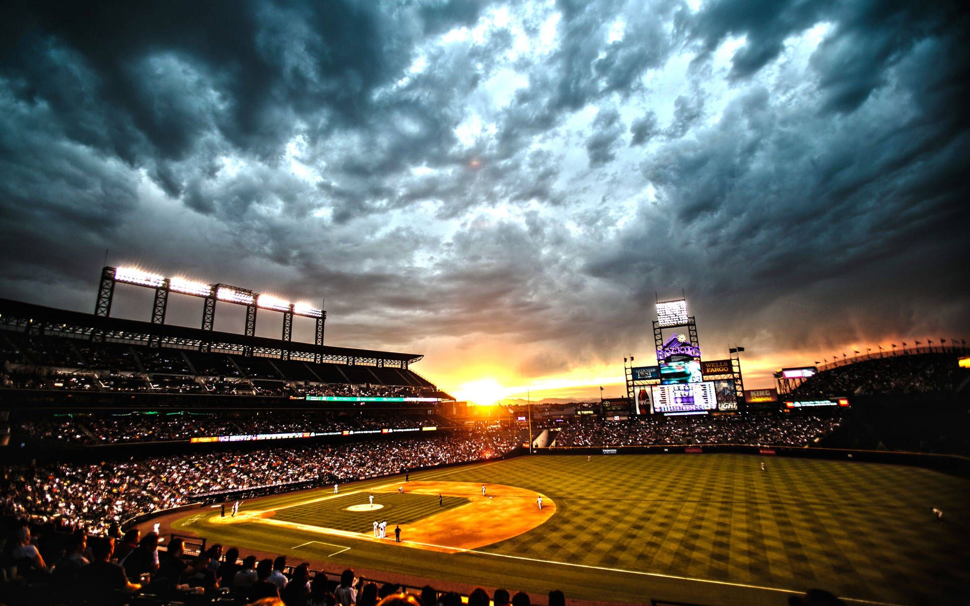 1920x1200 Download A stunning view of a baseball stadium at sunset Wallpaper