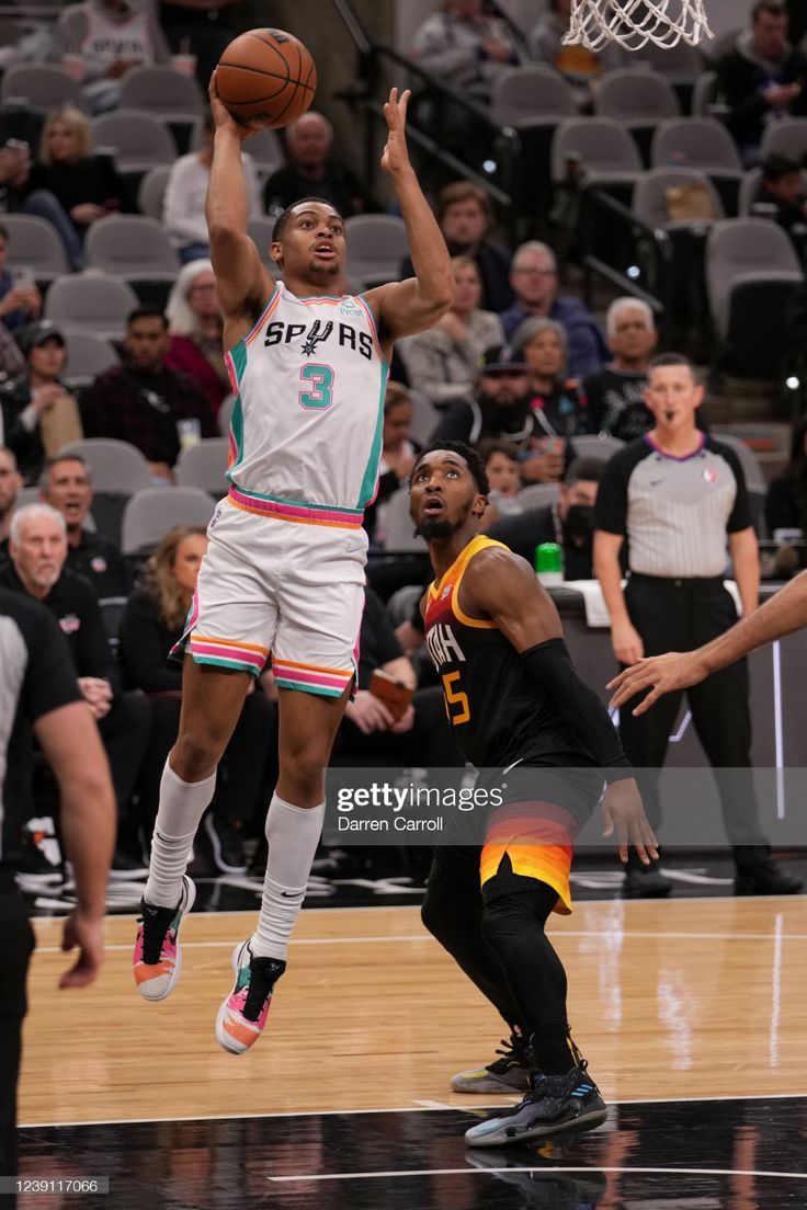 736x1104 Keldon Johnson of the San Antonio Spurs shoots the ball during the