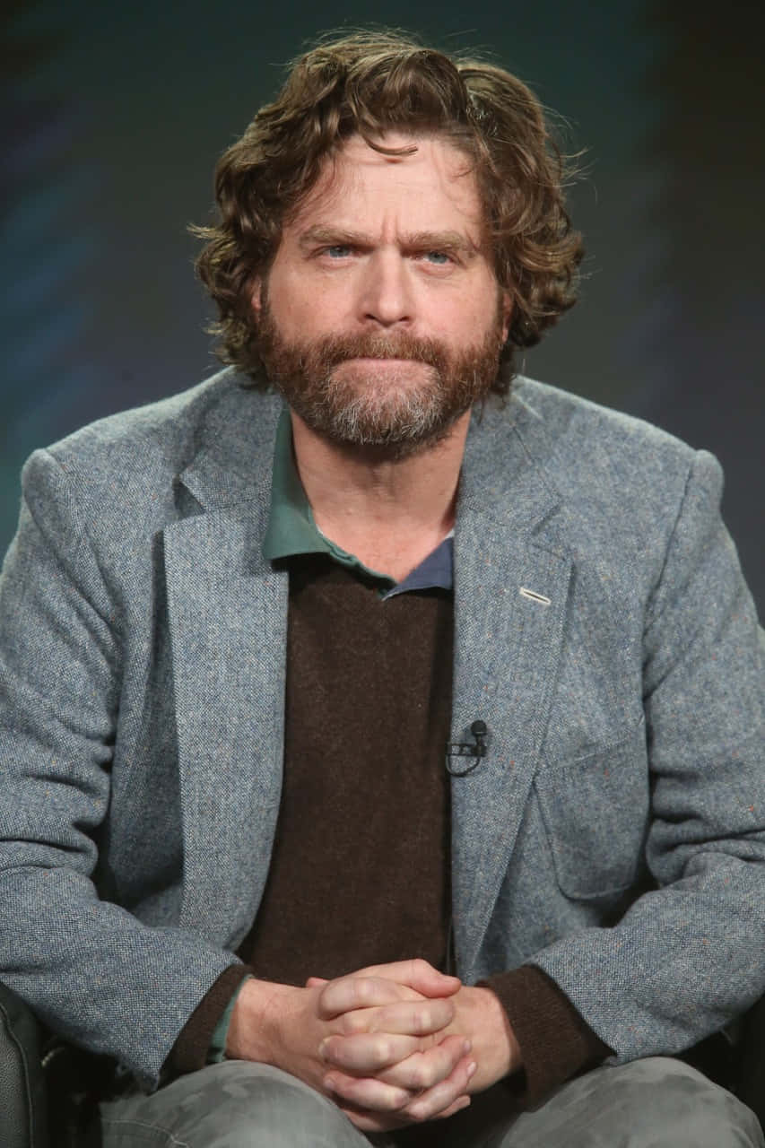 853x1280 Download Actor Zach Galifianakis poses for a photo. Wallpaper