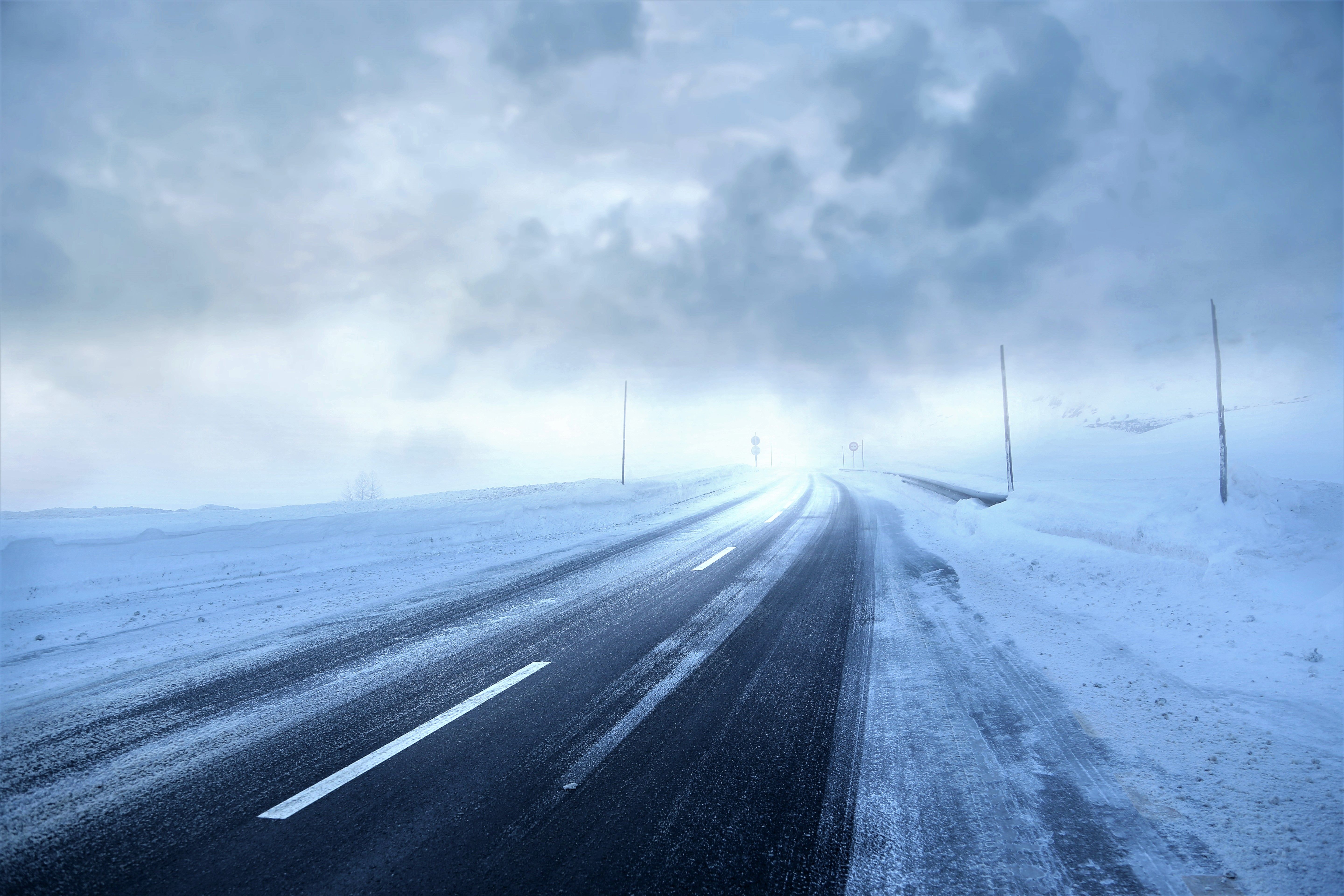 5760x3840 Winter's Veil: Stormy Road 4K Ultra HD Wallpaper