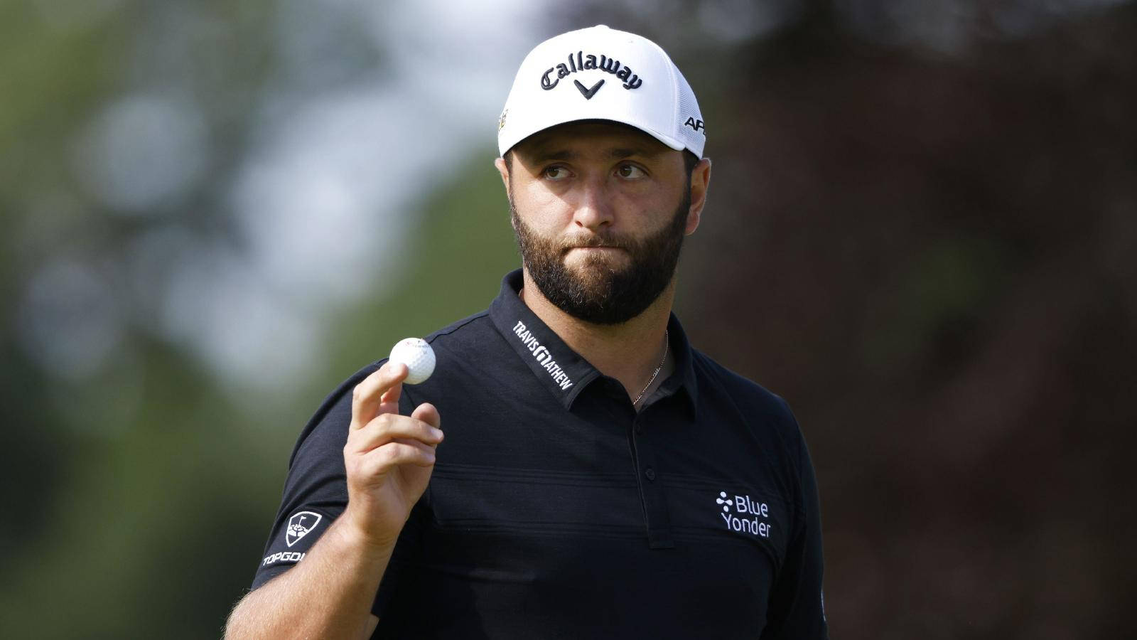 1600x900 Download Jon Rahm Holding A Golf Ball Wallpaper