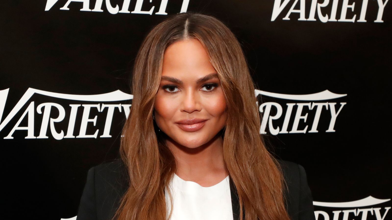 1600x900 Chrissy Teigen's entryway uses this underrated material. Homes and Gardens