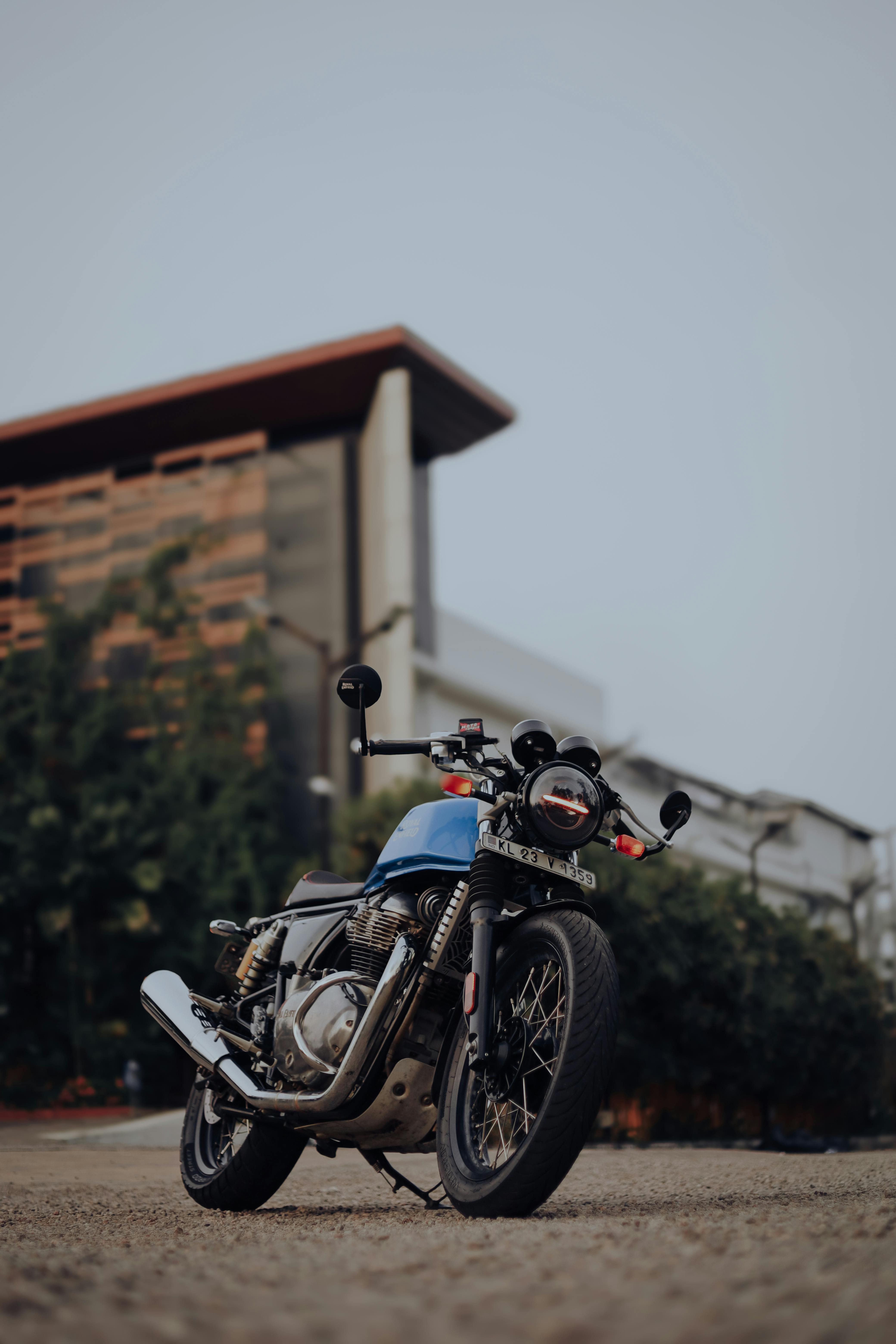4160x6240 A Royal Enfield Gt 650 Parked on the Beach · Free