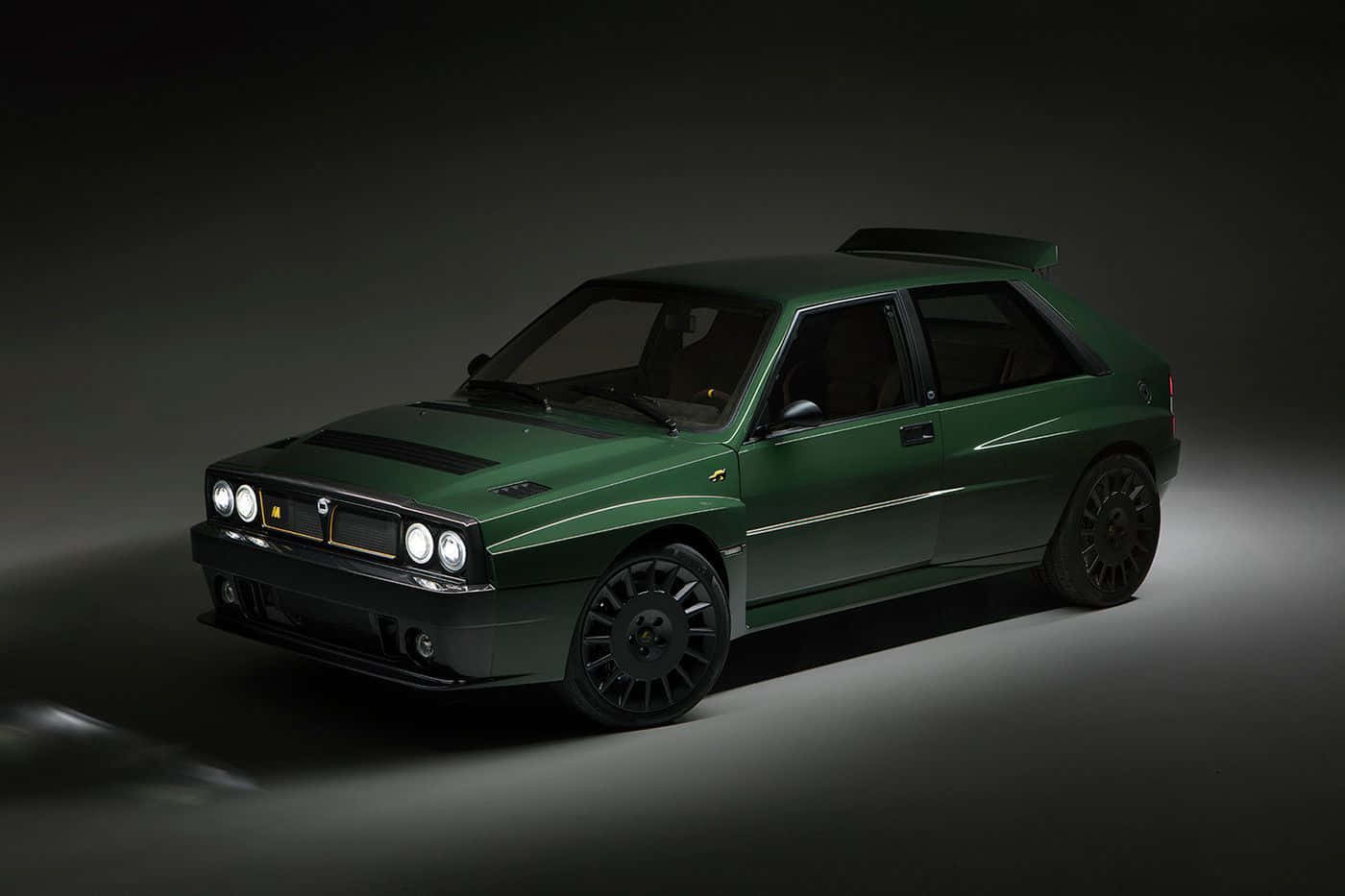 1400x933 Download Caption: Lancia Delta Integrale on the Road Wallpaper