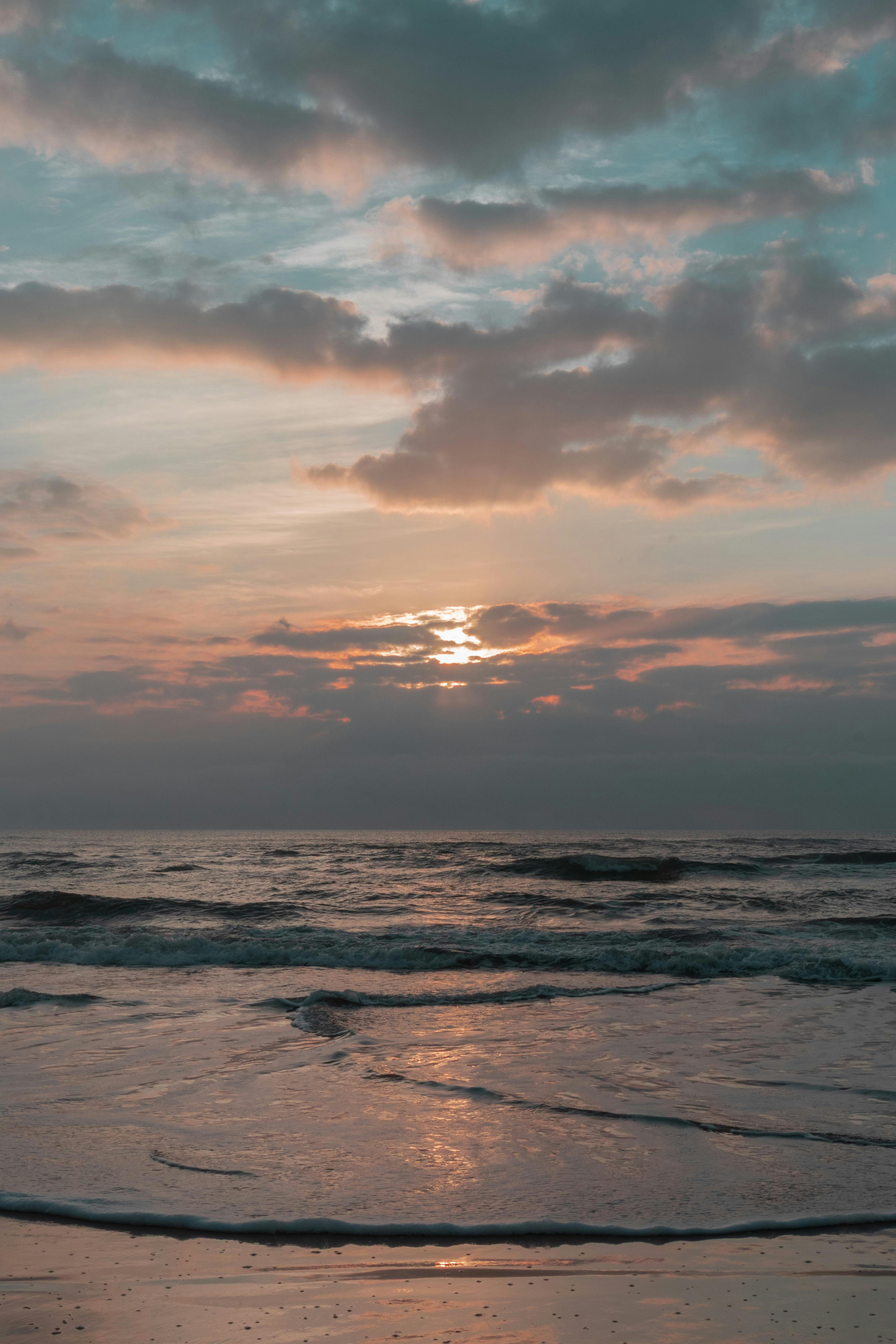 3840x5760 Sunset Over Waves at Kuta Beach, Bali, Indonesia · Free