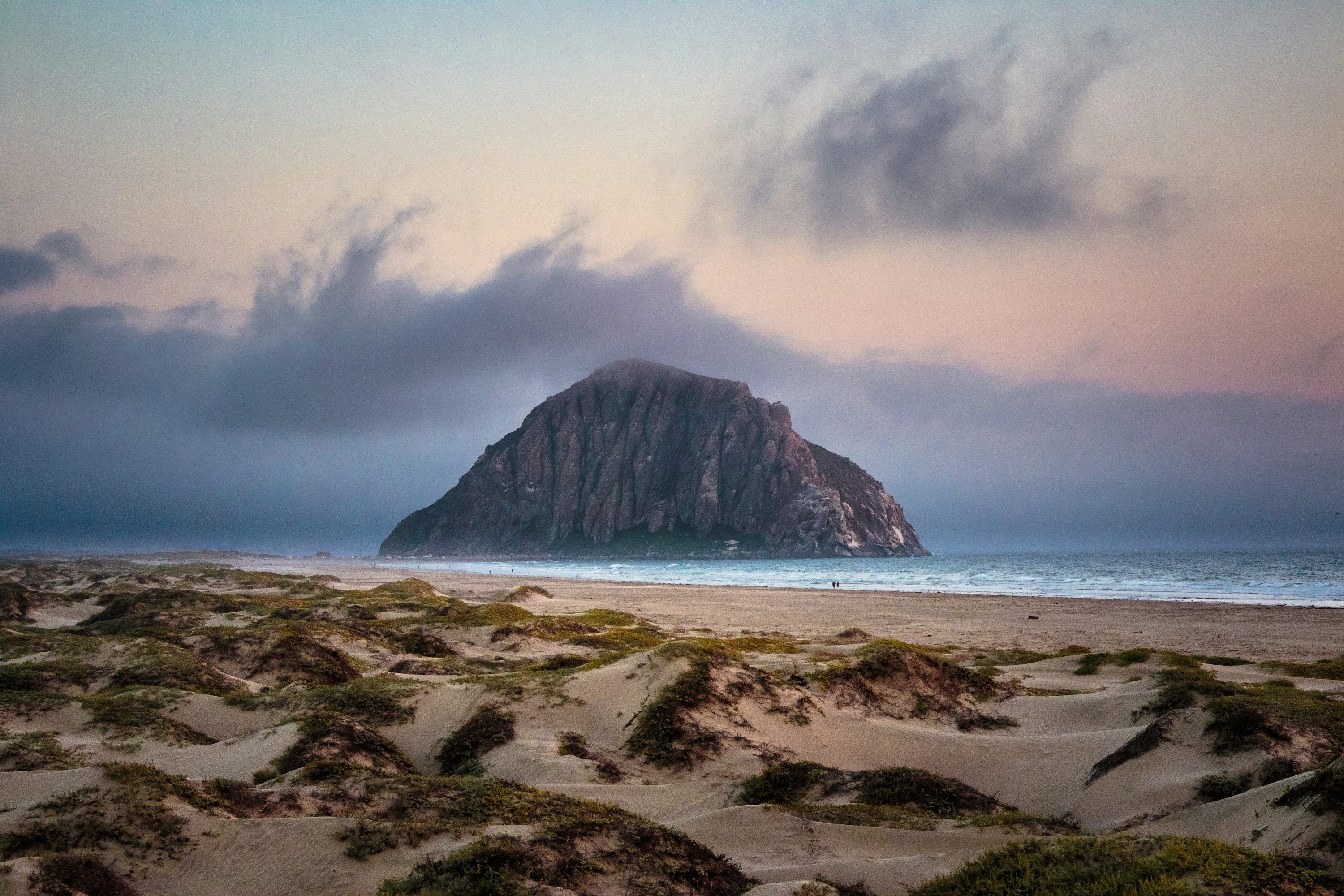 3000x2000 Landscape photo of brown mountain surrounded by body of water near seashore photo