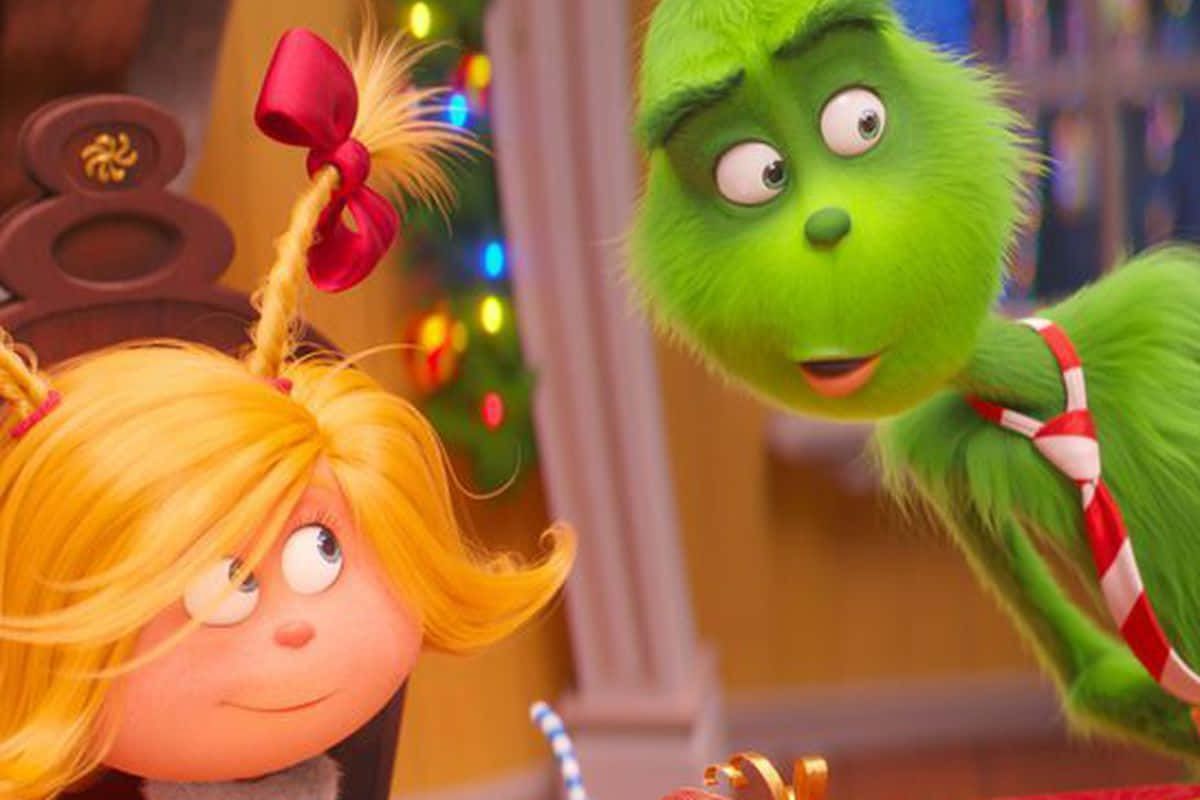 1200x800 Download The Grinch And The Girl Are Sitting At A Table Wallpaper