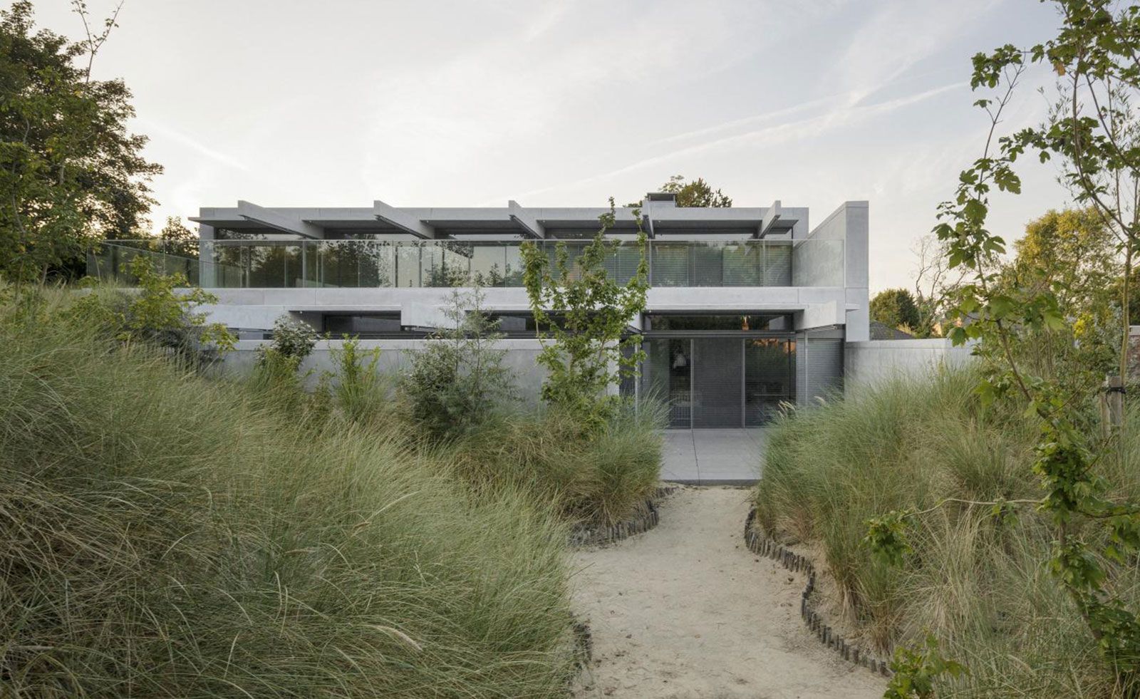 1600x981 Concrete and glass house by i.s.m.architecten in Belgium. Wallpaper*