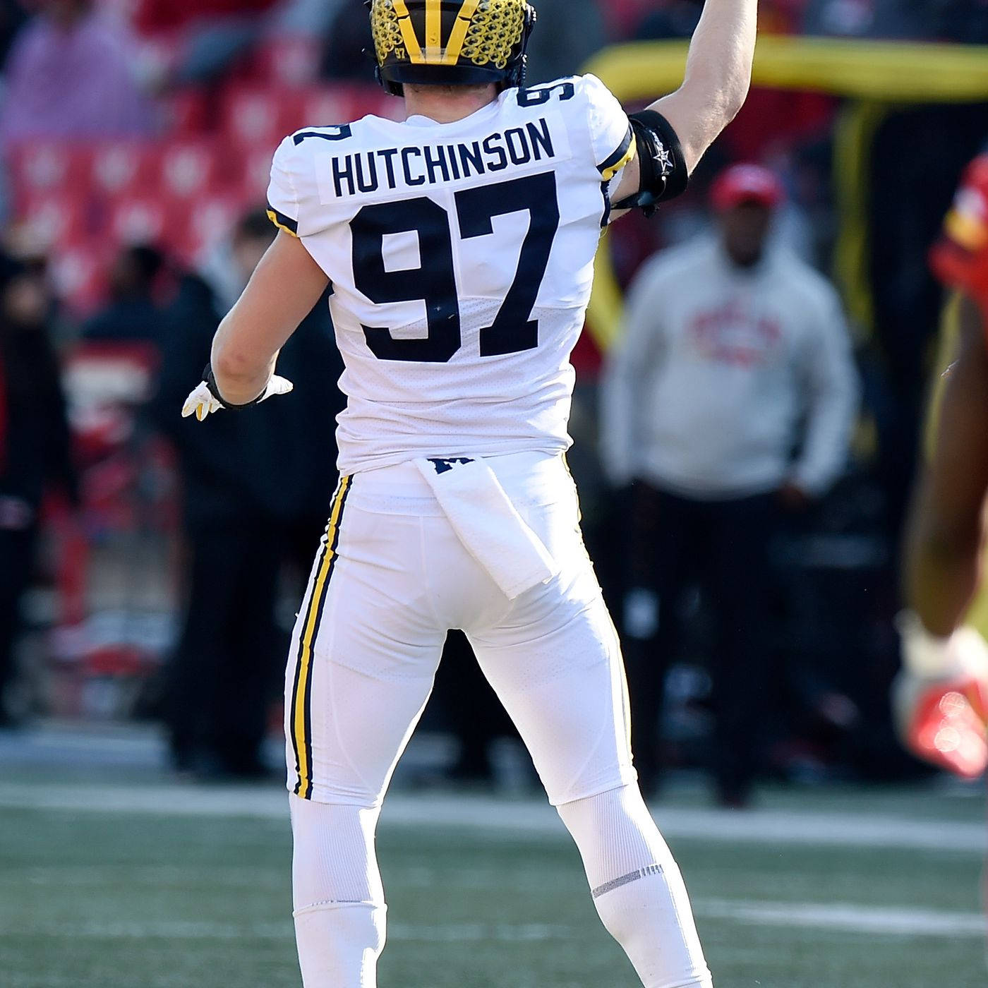 1400x1400 Download Caption: Aidan Hutchinson in Action for Michigan Wolverines in NCAA Football Wallpaper