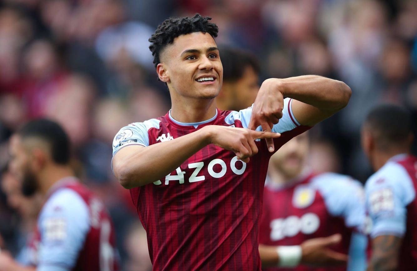 1333x868 Download Ollie Watkins in action during a football match Wallpaper
