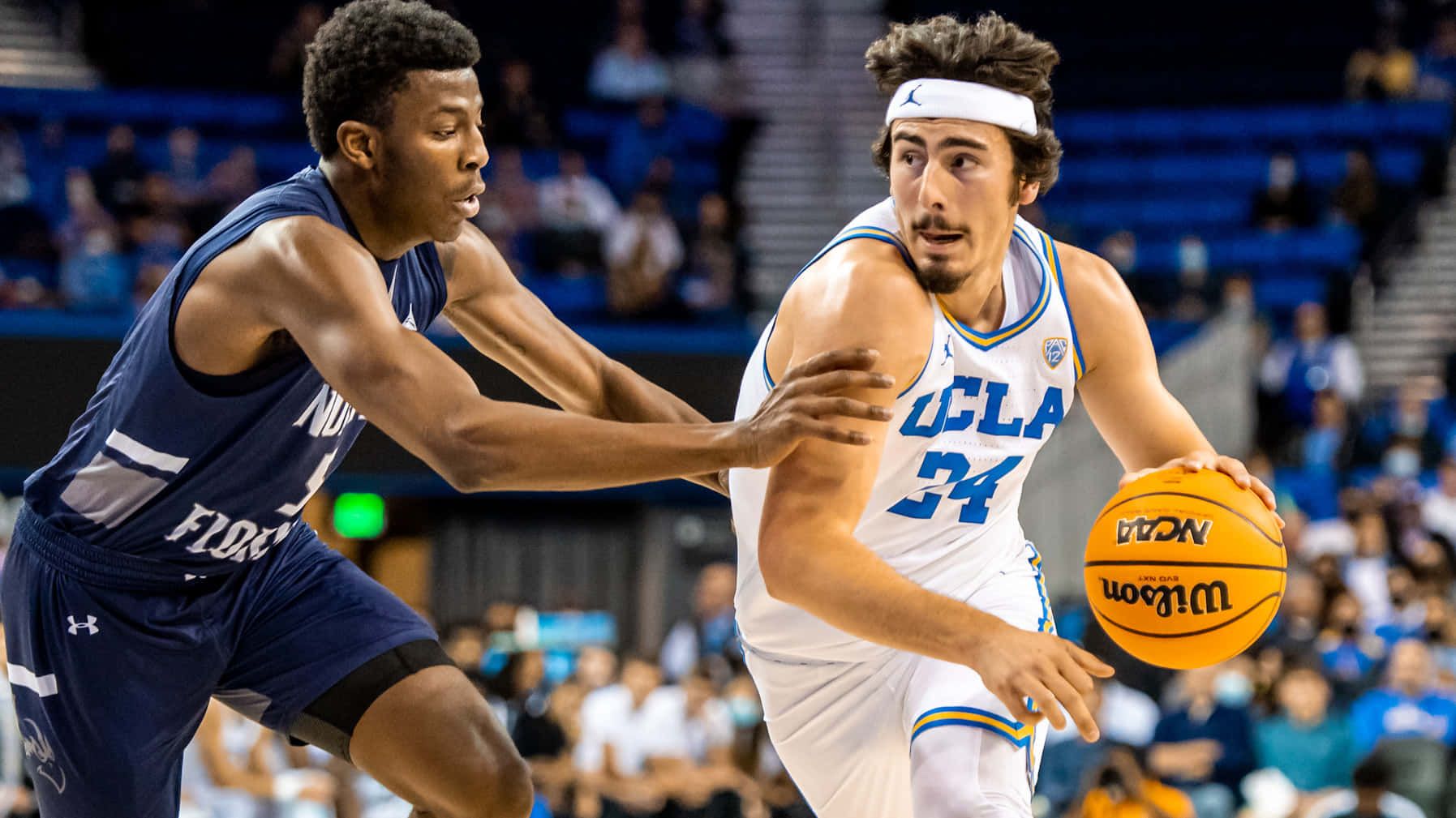 1795x1009 Download Jaime Jaquez Jr. In Action During A Professional Basketball Game Wallpaper