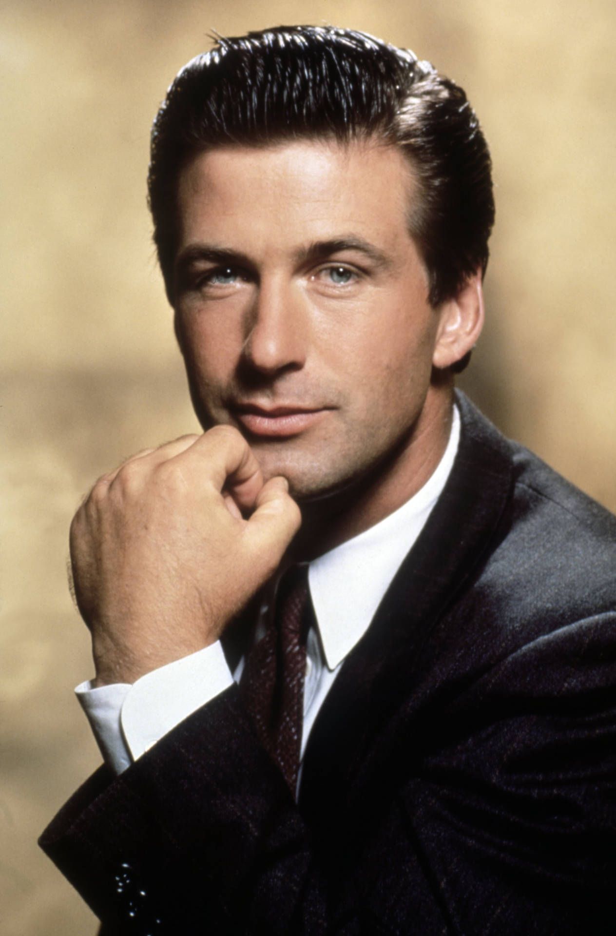 1264x1920 Download Charismatic And Young Alec Baldwin Wallpaper