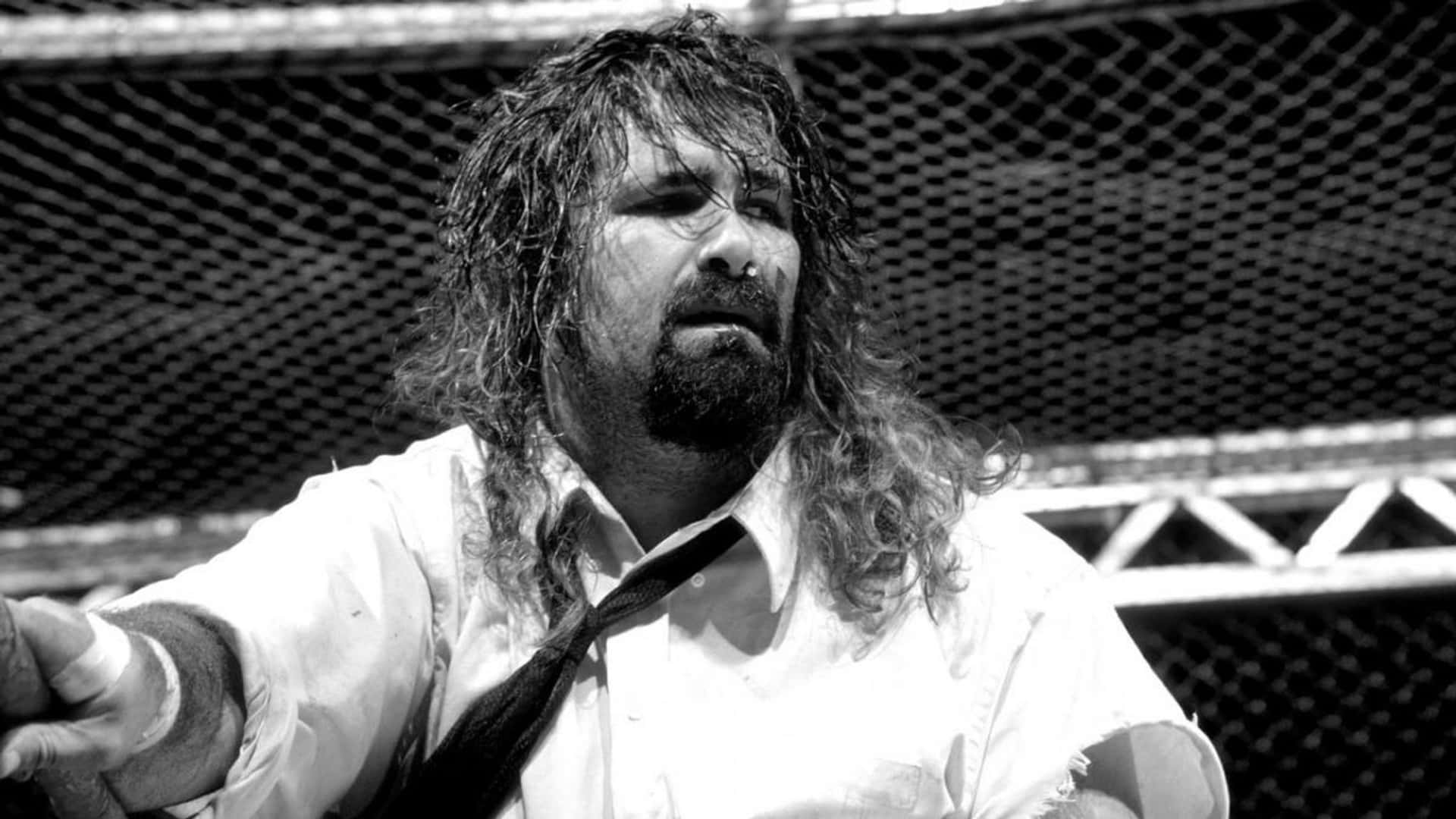 1920x1080 Download Legendary WWE wrestler Mick Foley in the middle of a sensational match in 1998. Wallpaper