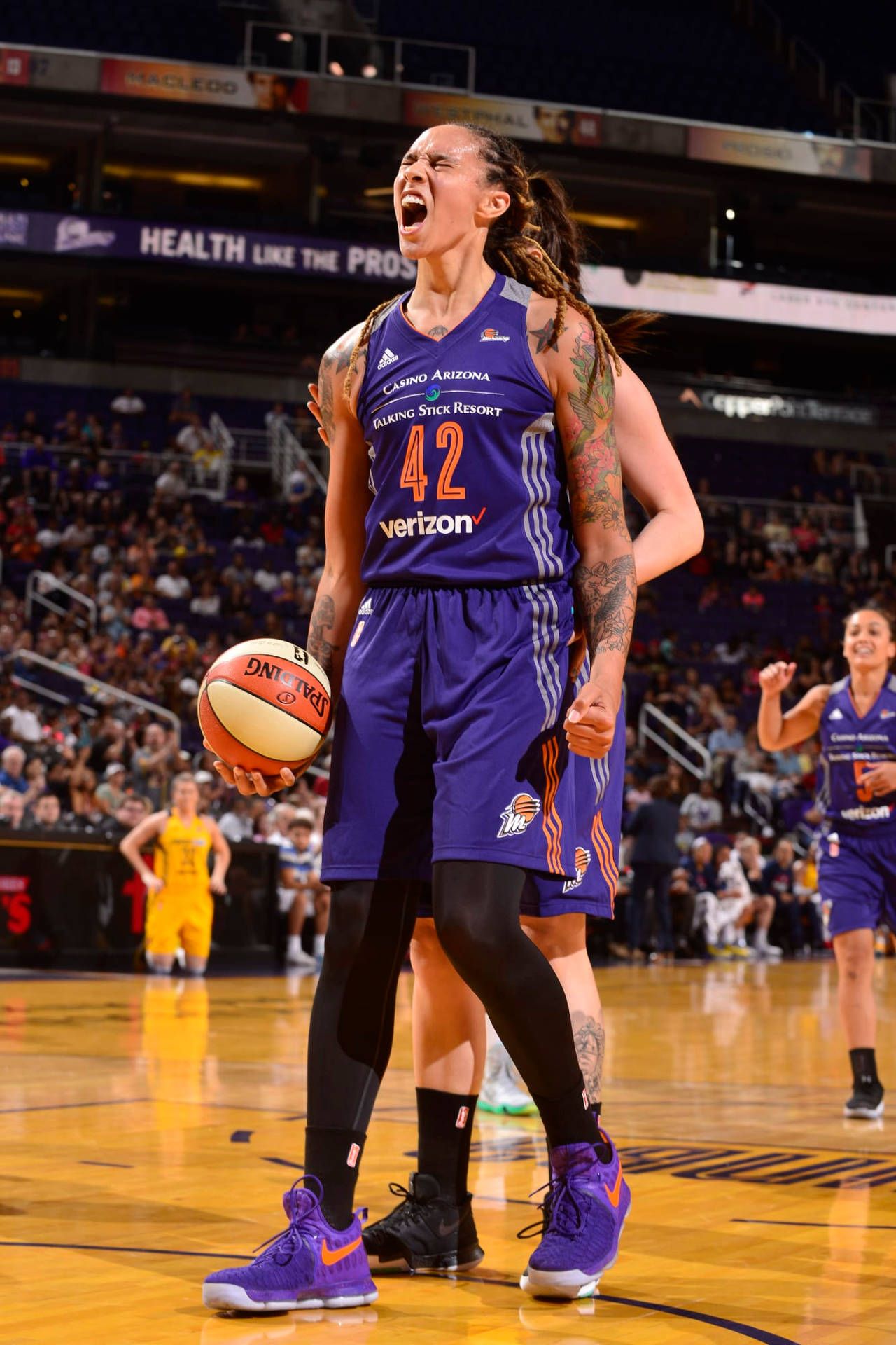 1280x1920 Download Brittney Griner Screaming Fists Wallpaper