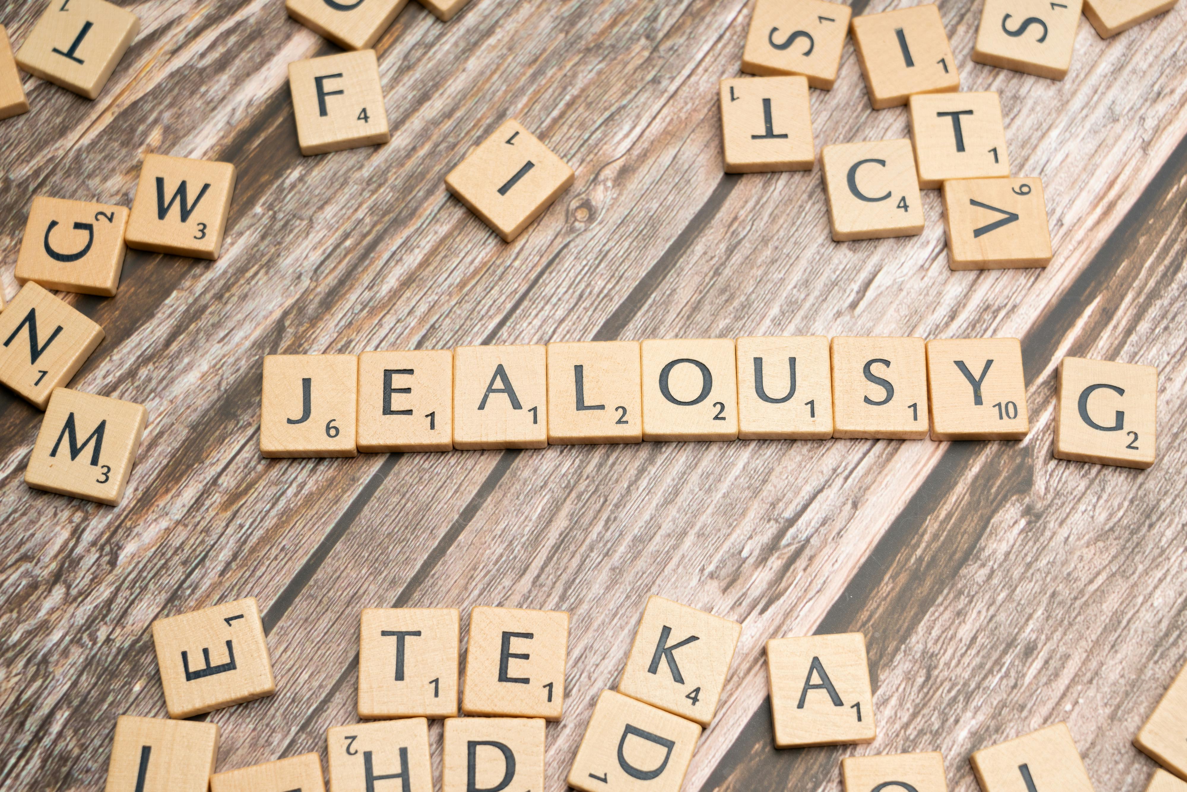 3999x2667 Scrabble Blocks Forming Jealousy Word · Free