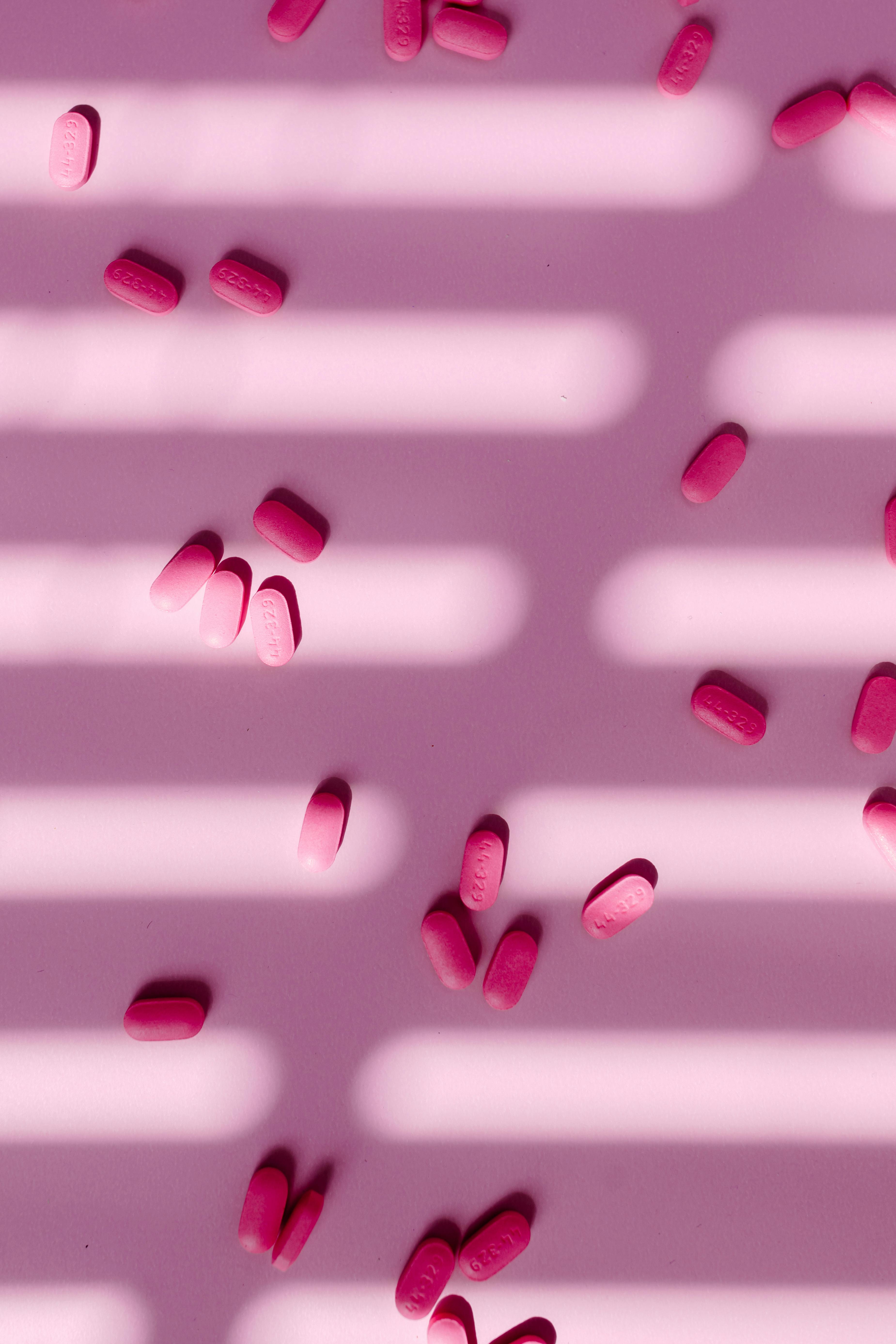 3699x5548 Pink Tablets on Light Pink Background · Free