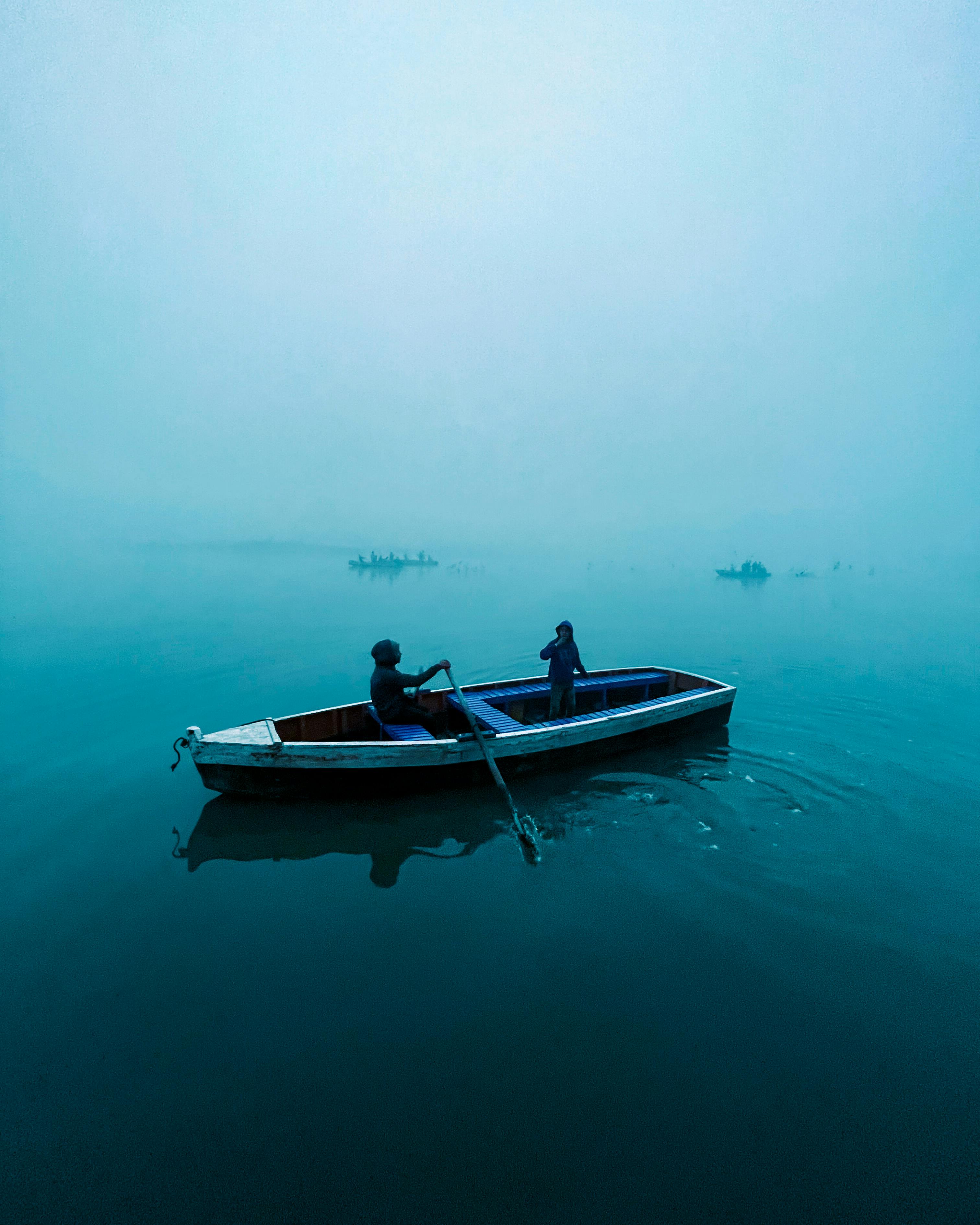 3024x3780 Aerial View of People in a Rowboat · Free