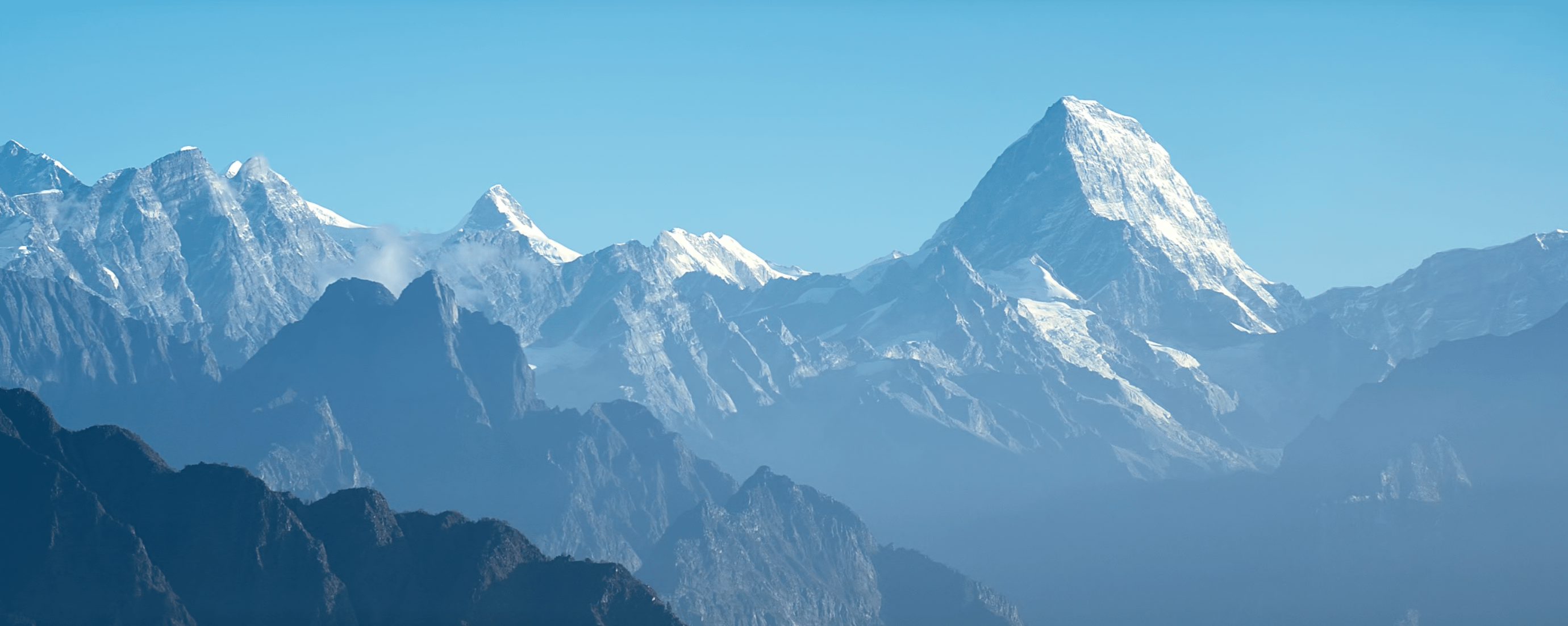 2760x1102 What mountain peak is this? From macOS wallpaper named Himalayas Day