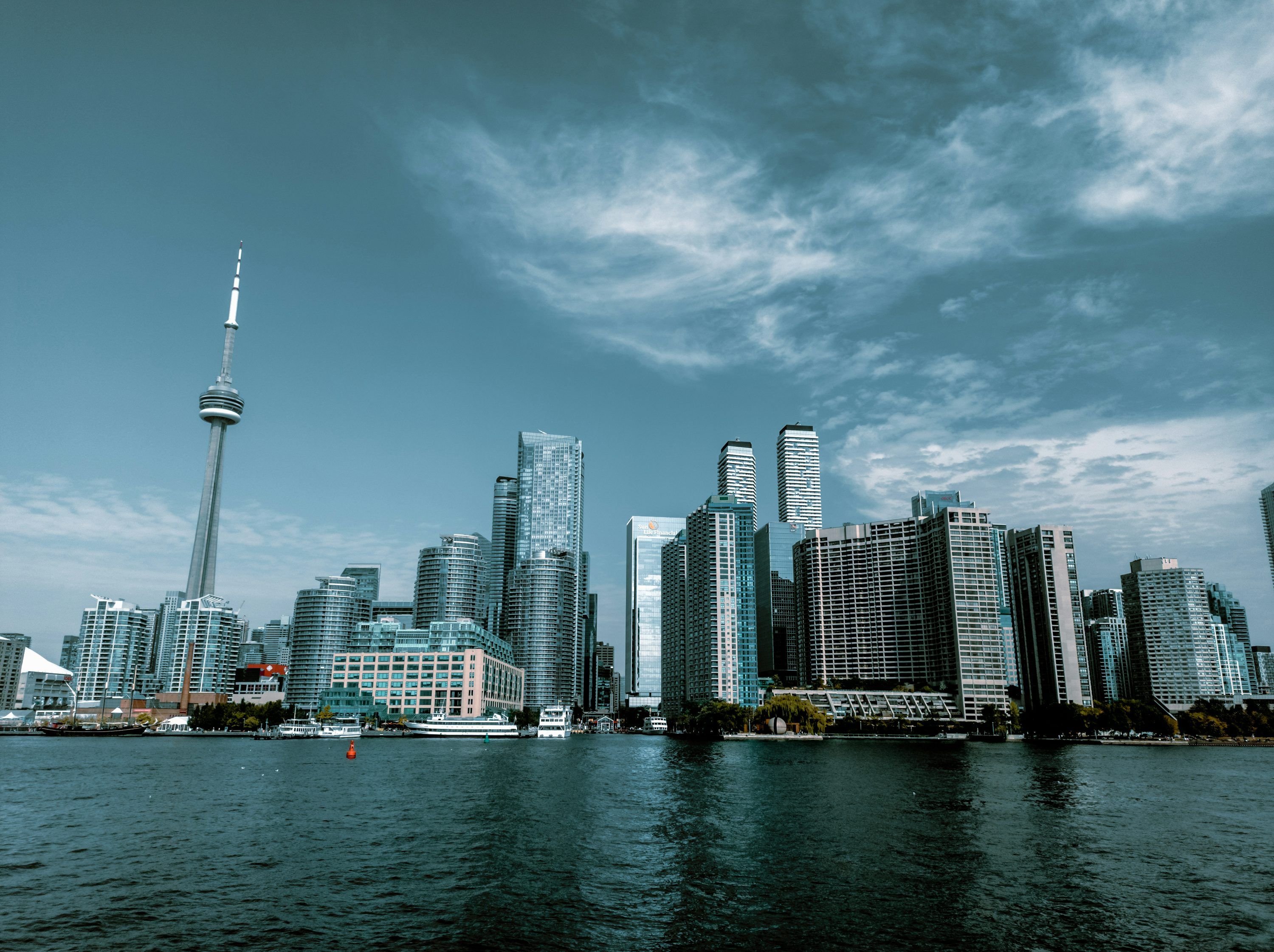 3000x2242 A view of a city from the water photo