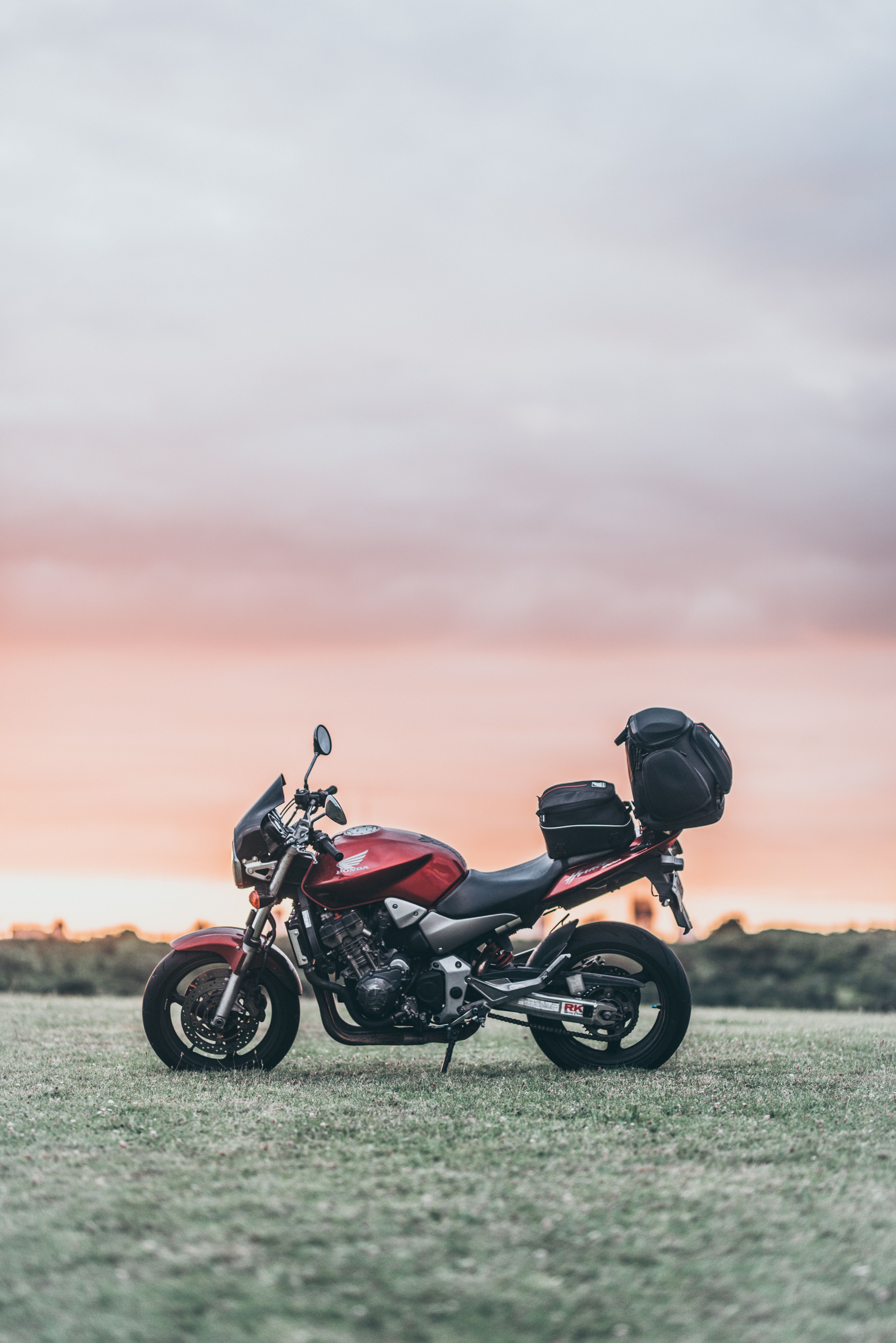 4016x6016 Wallpaper Black and Red Motorcycle on Green Grass Field During Daytime, Background Free Image