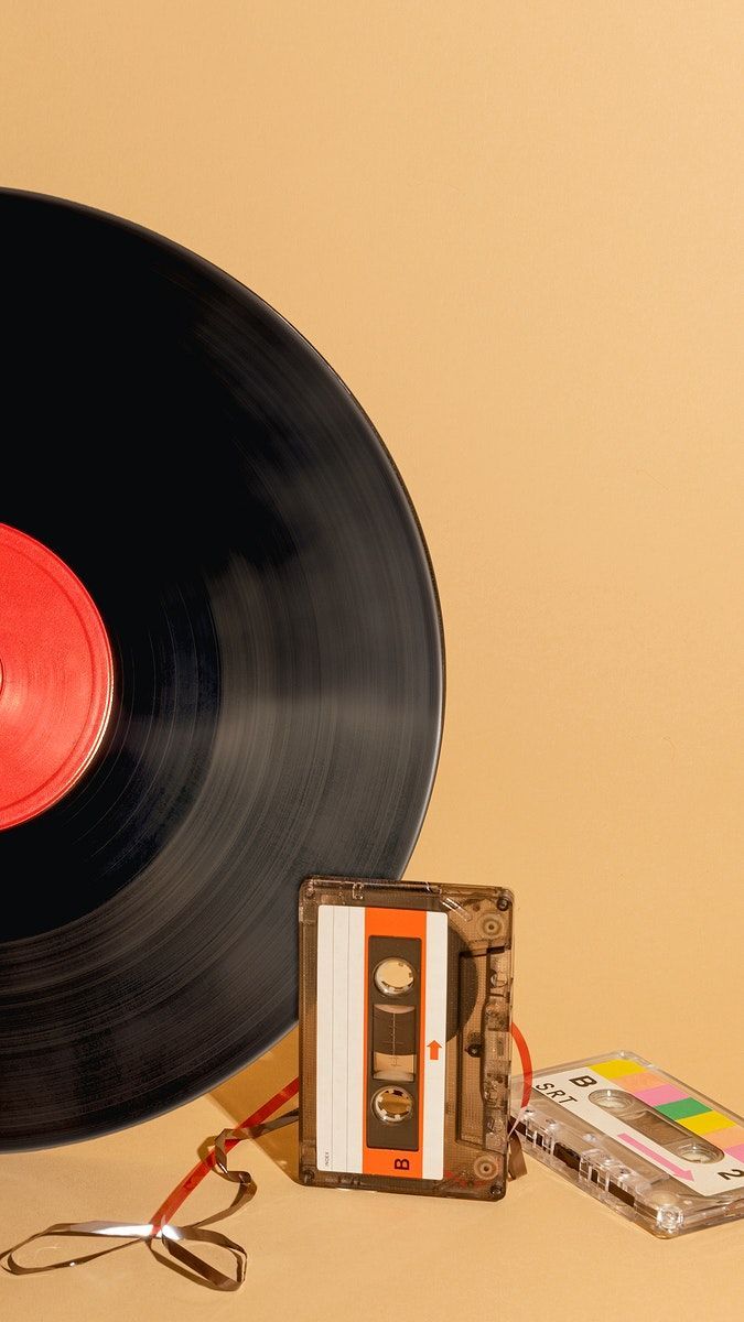 675x1200 Download premium image of Vinyl record and a cassette tape design resource by Jira about wallpaper song, iphone wallpaper music, iphone wallpaper, music wallpaper mobile, and mobile wallpaper 2377220