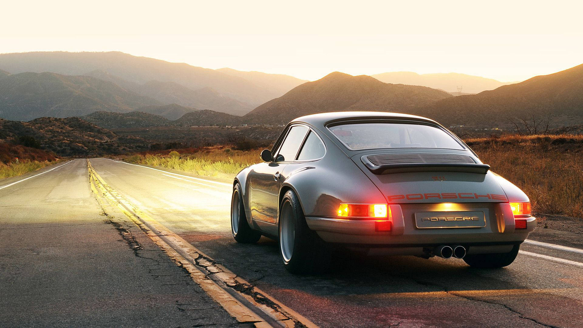 1920x1080 Download Caption: Majestic Singer Porsche 911 Illuminated in the Night Wallpaper