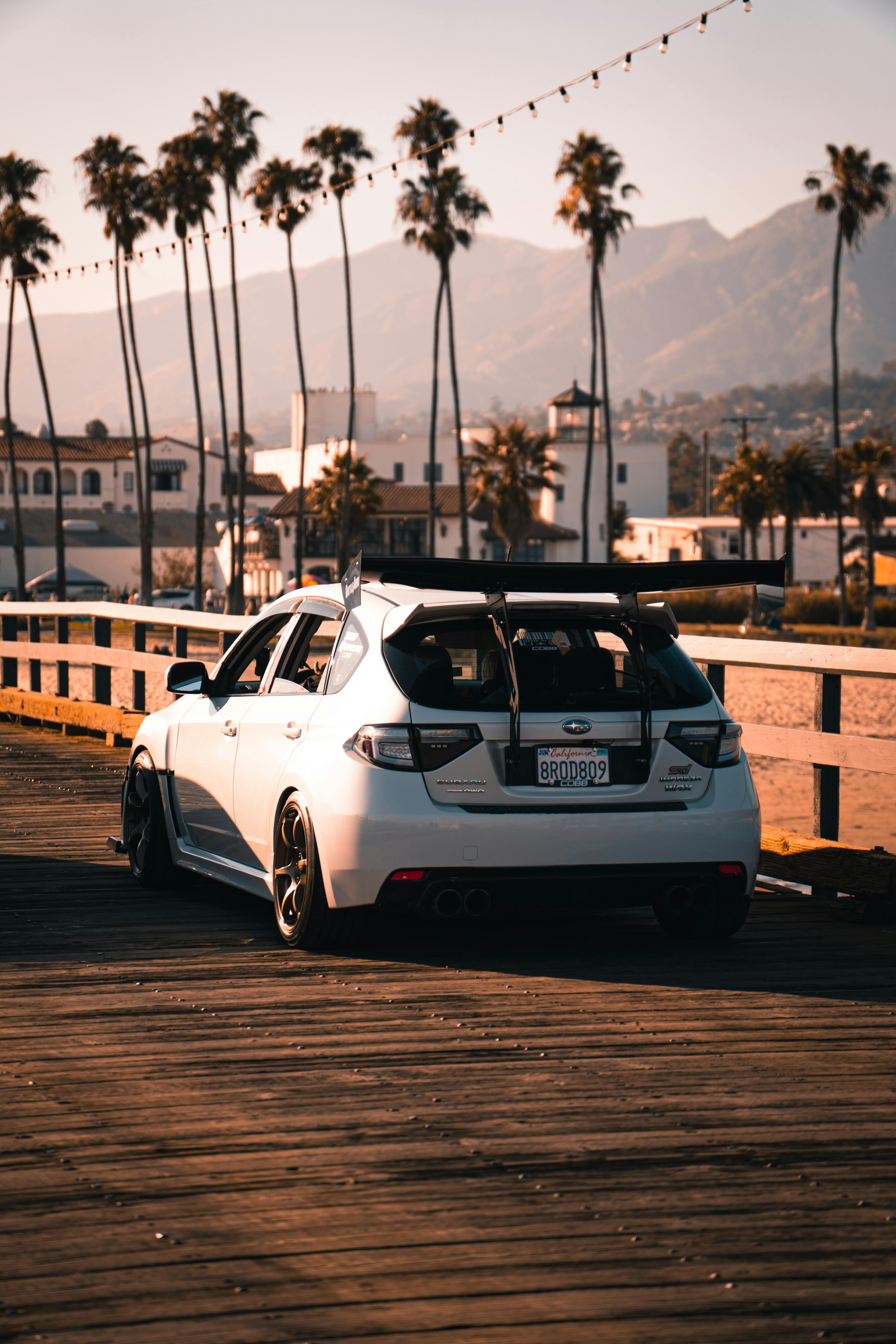4000x6000 Back View of Orange Subaru Impreza WRX · Free