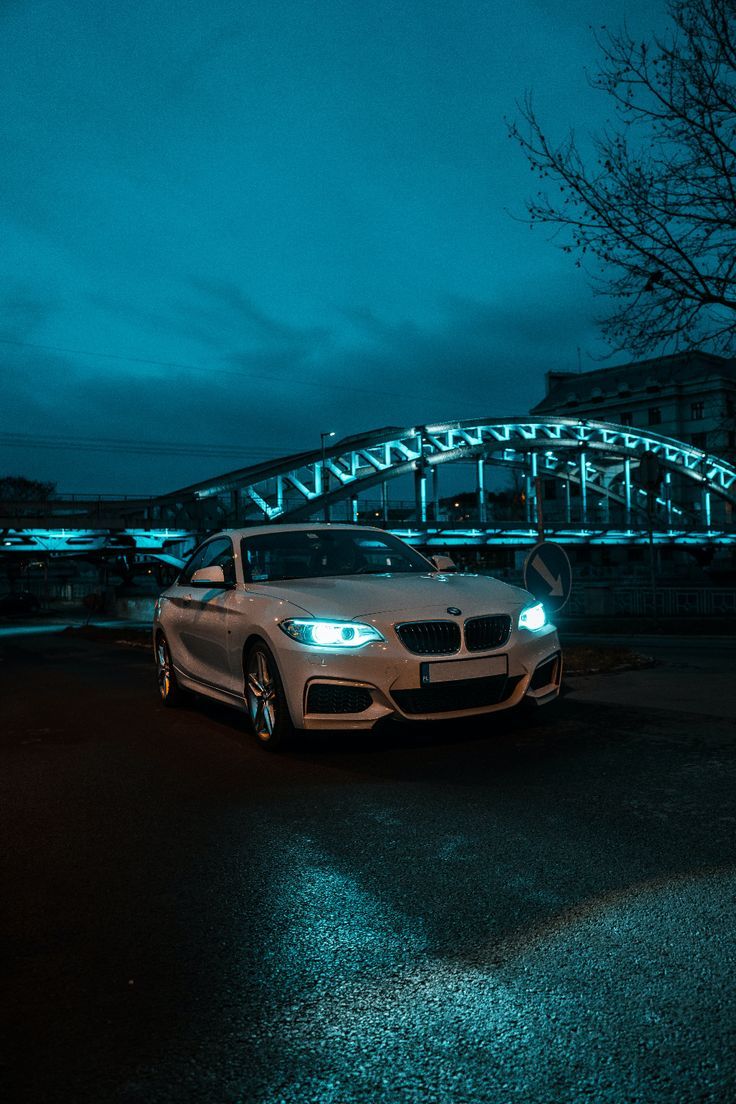 736x1104 Download wallpaper 4000x6000 bmw, front view, headlights, white HD background