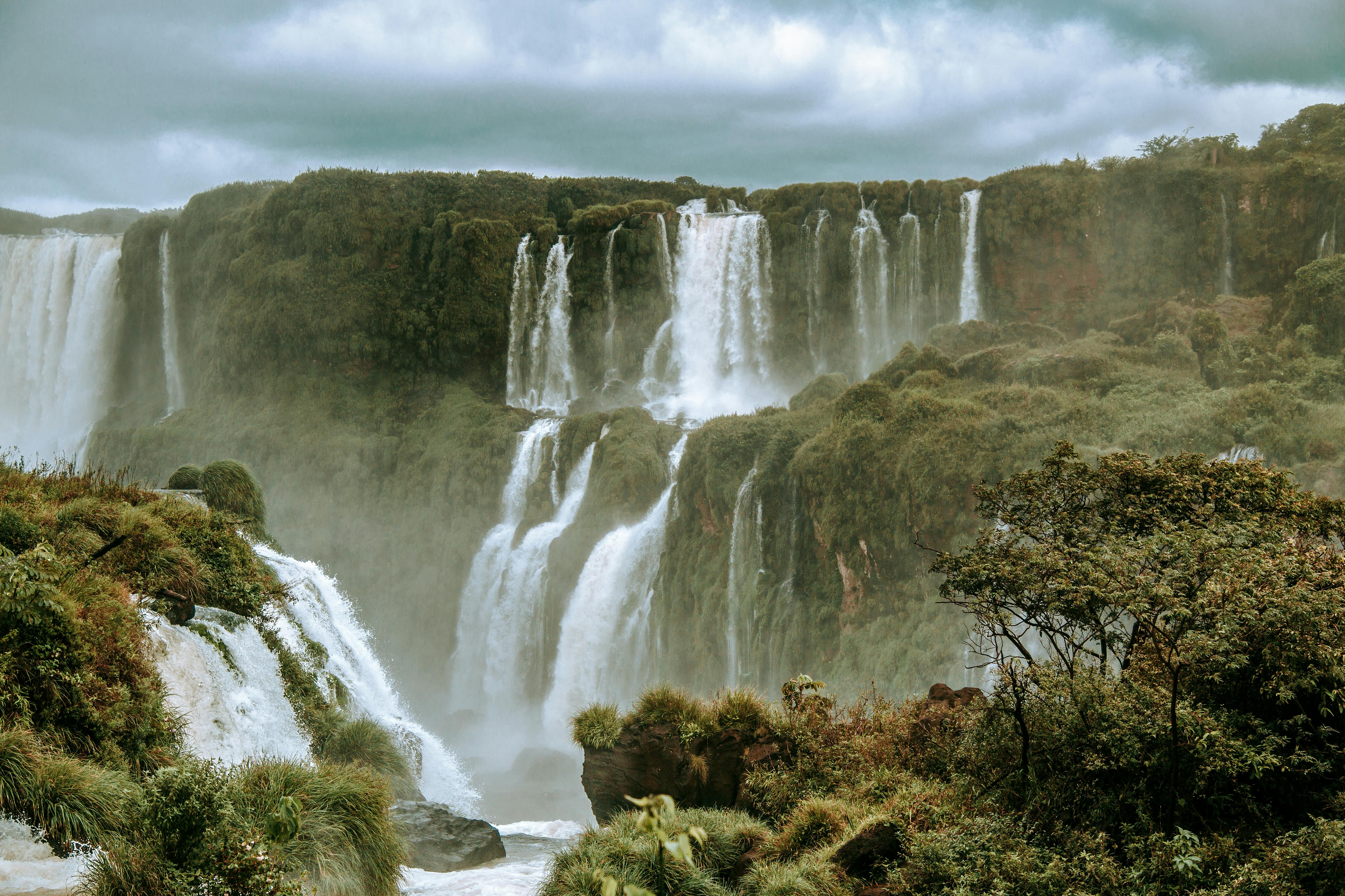 5472x3648 Waterfalls Under Cloudy Sky · Free