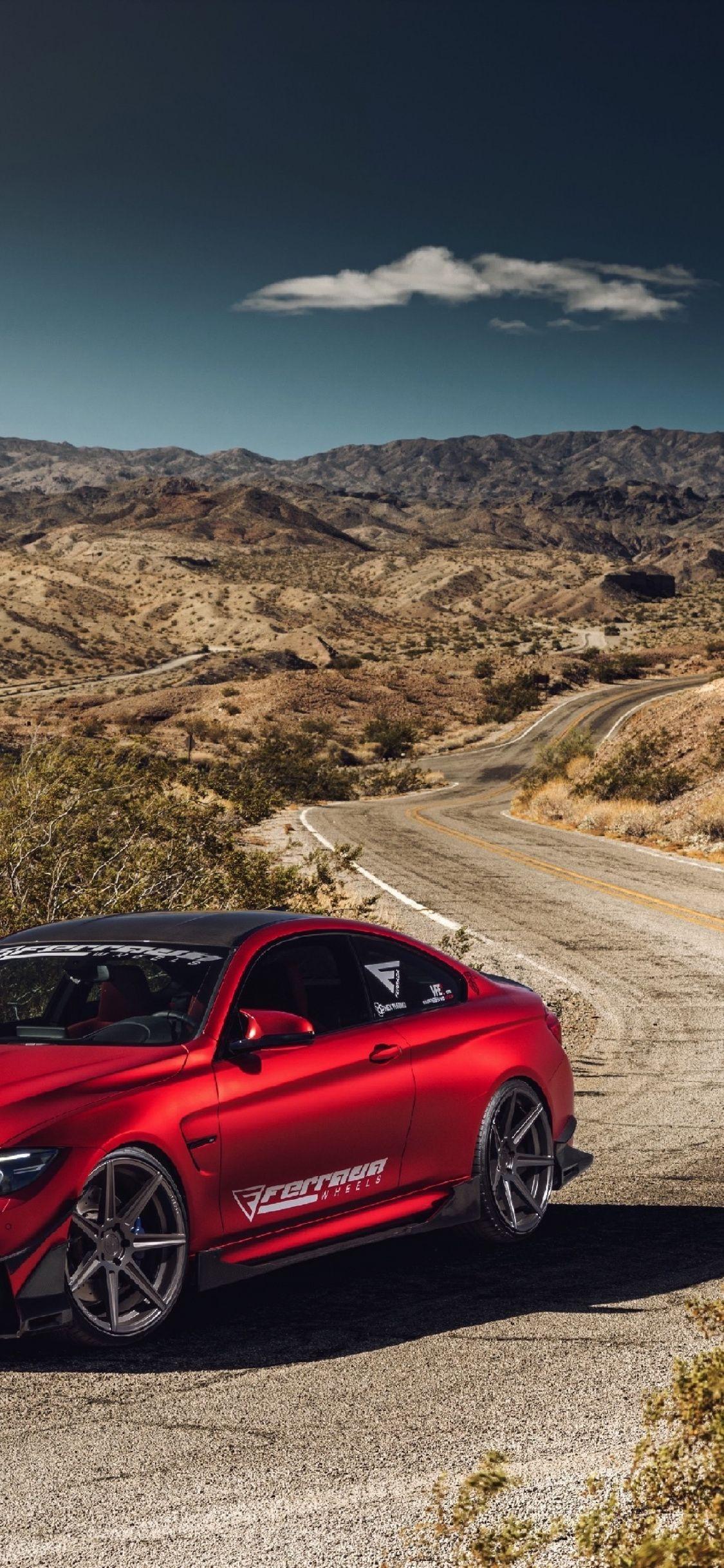1125x2436 Download 1125x2436 wallpaper red, bmw m luxury car, outdoor