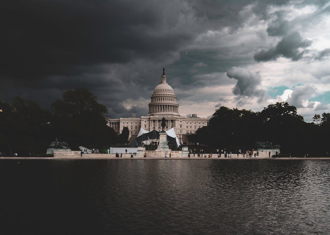 1053x750 Dome Building Near Body Of Water Under Cloudy Sky · Free