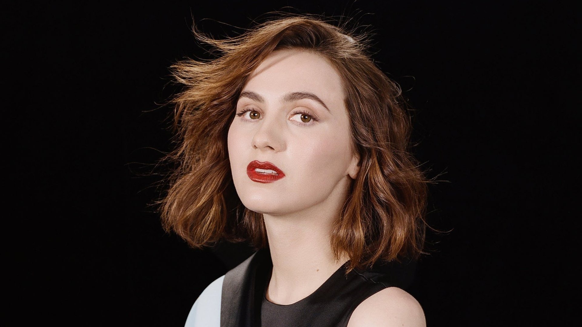 1920x1080 Black Short Hair Maude Apatow Girl Model Is Wearing Black Dress Red Lipstick In Dark Background HD Girls Wallpaper