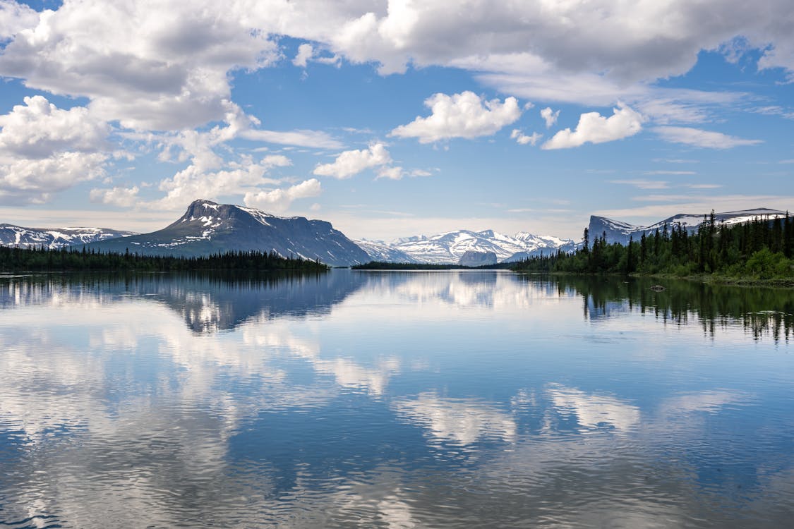 1125x750 Body of Water Under Cloudy Sky · Free