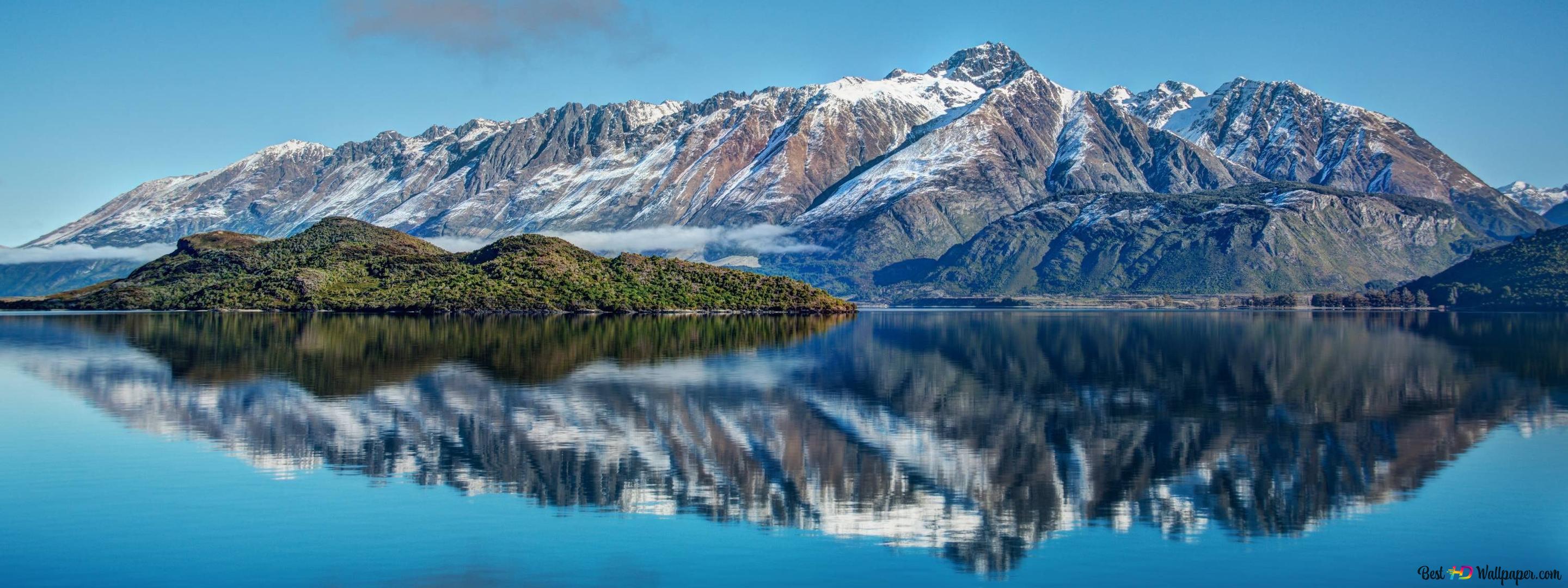2880x1080 Perfect reflection of snowy mountains and trees in the lake water 2K wallpaper download